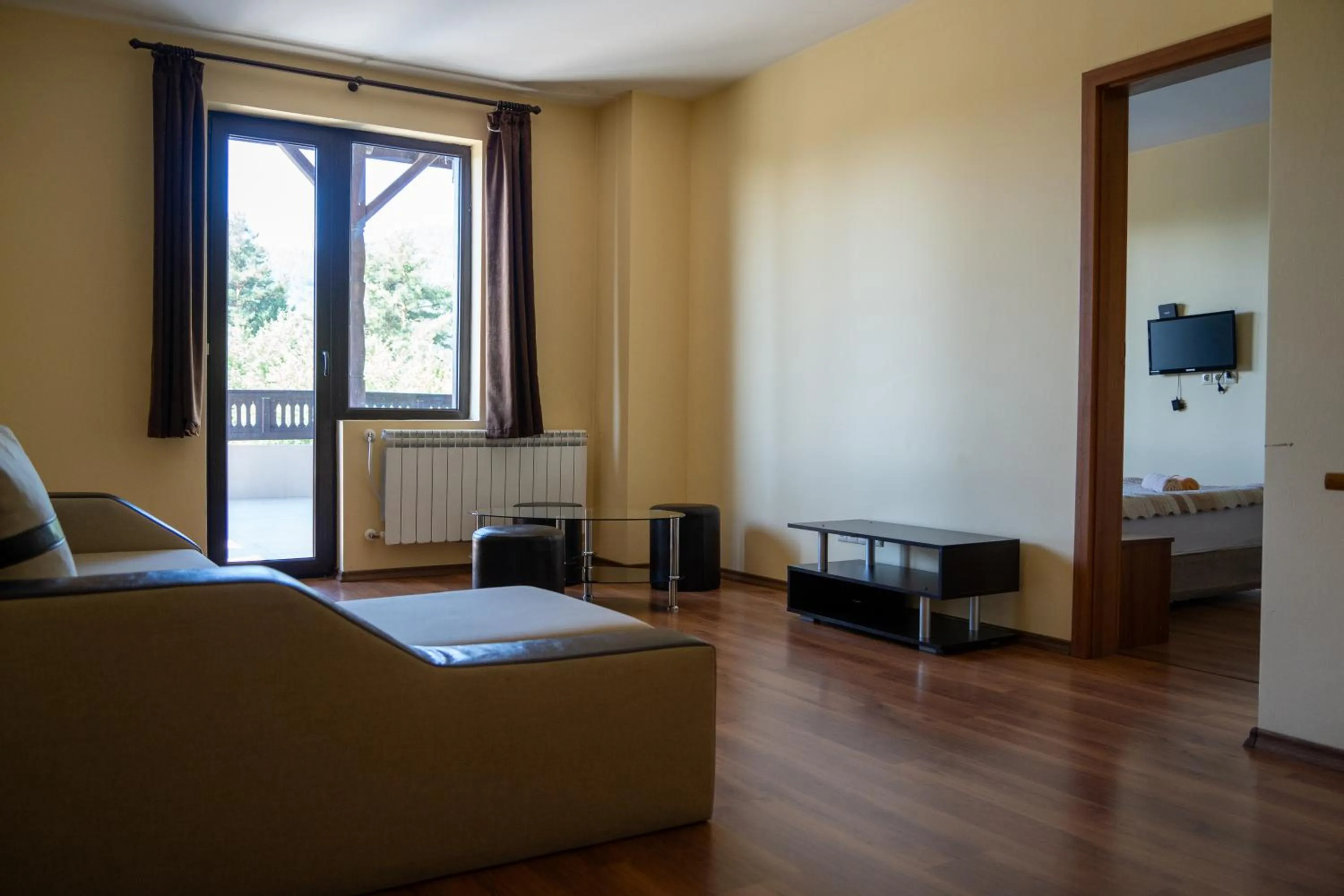 Living room, Bed in Rusaliite Adventure House