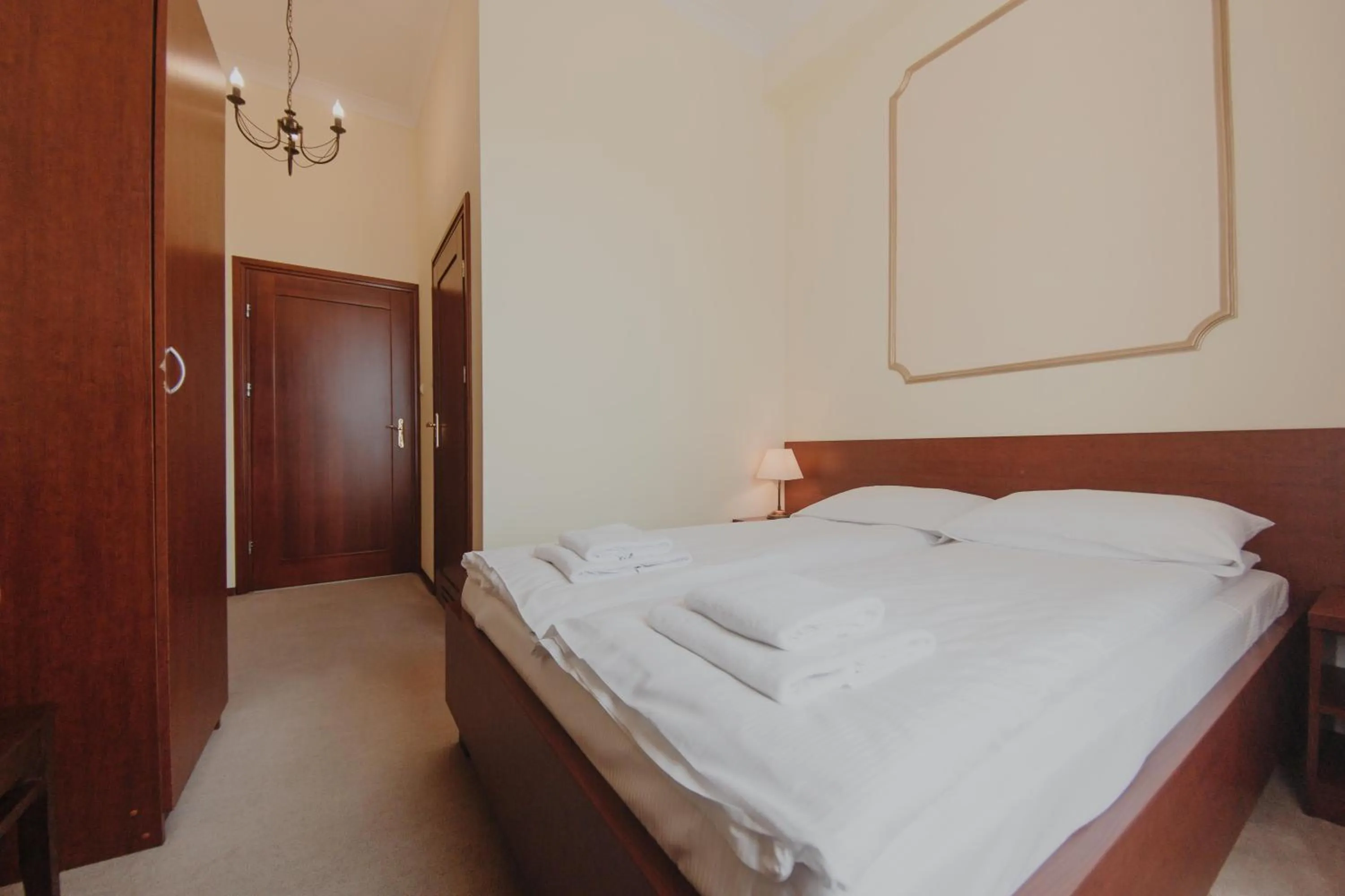 Bed in Hotel Cesarski - Kaiserhof