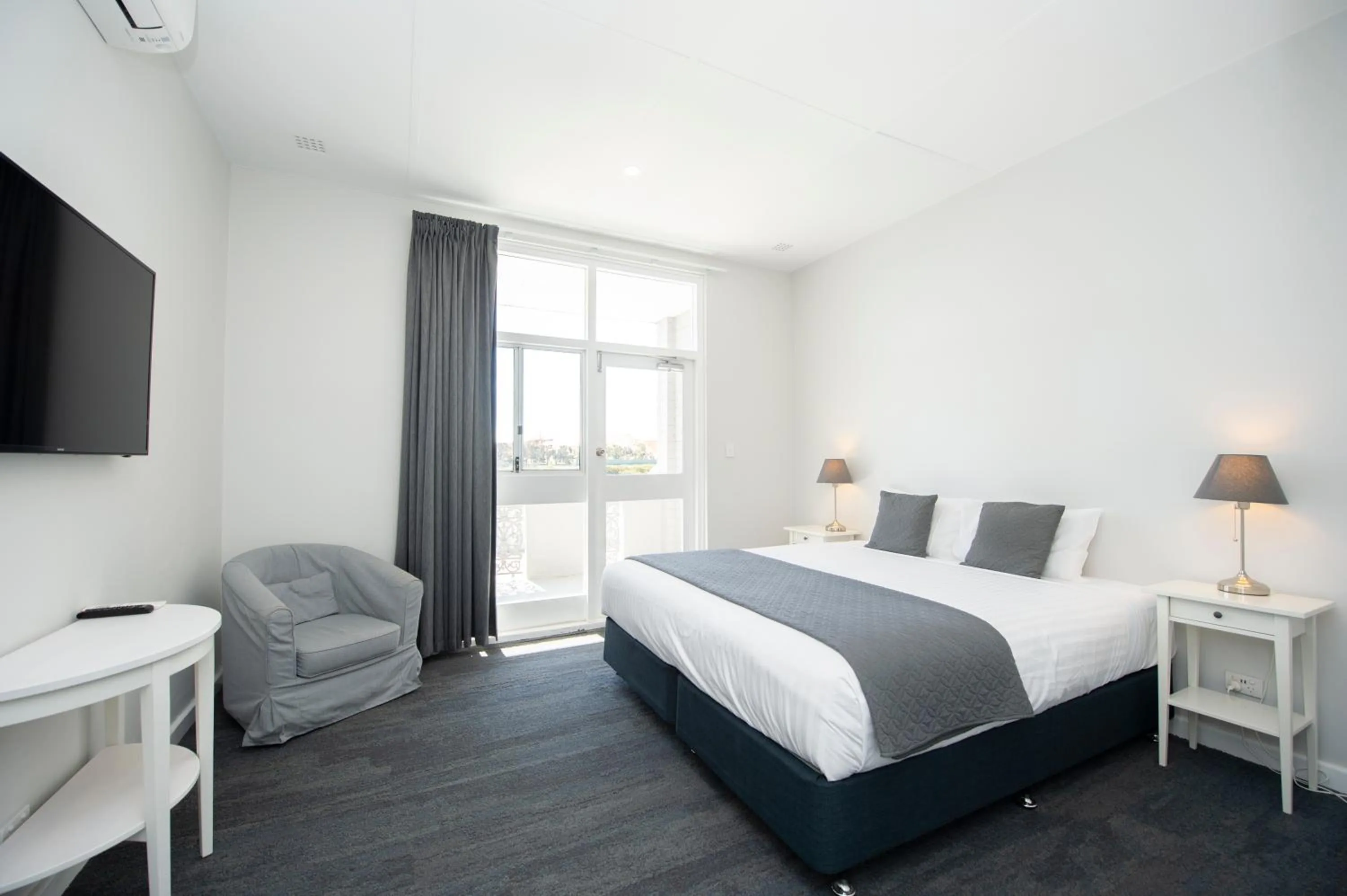 Bed in The Parade Hotel