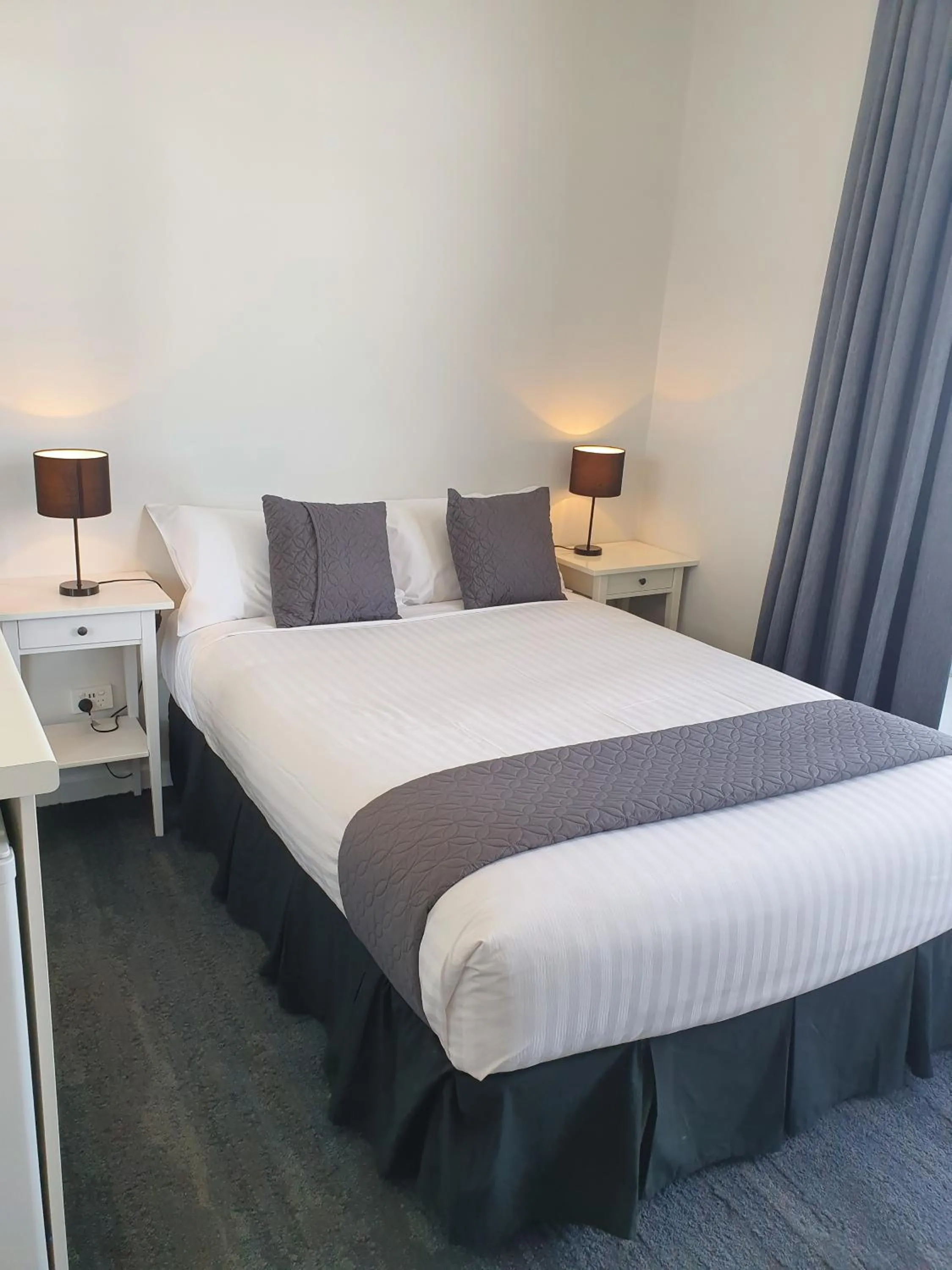 Bed in The Parade Hotel