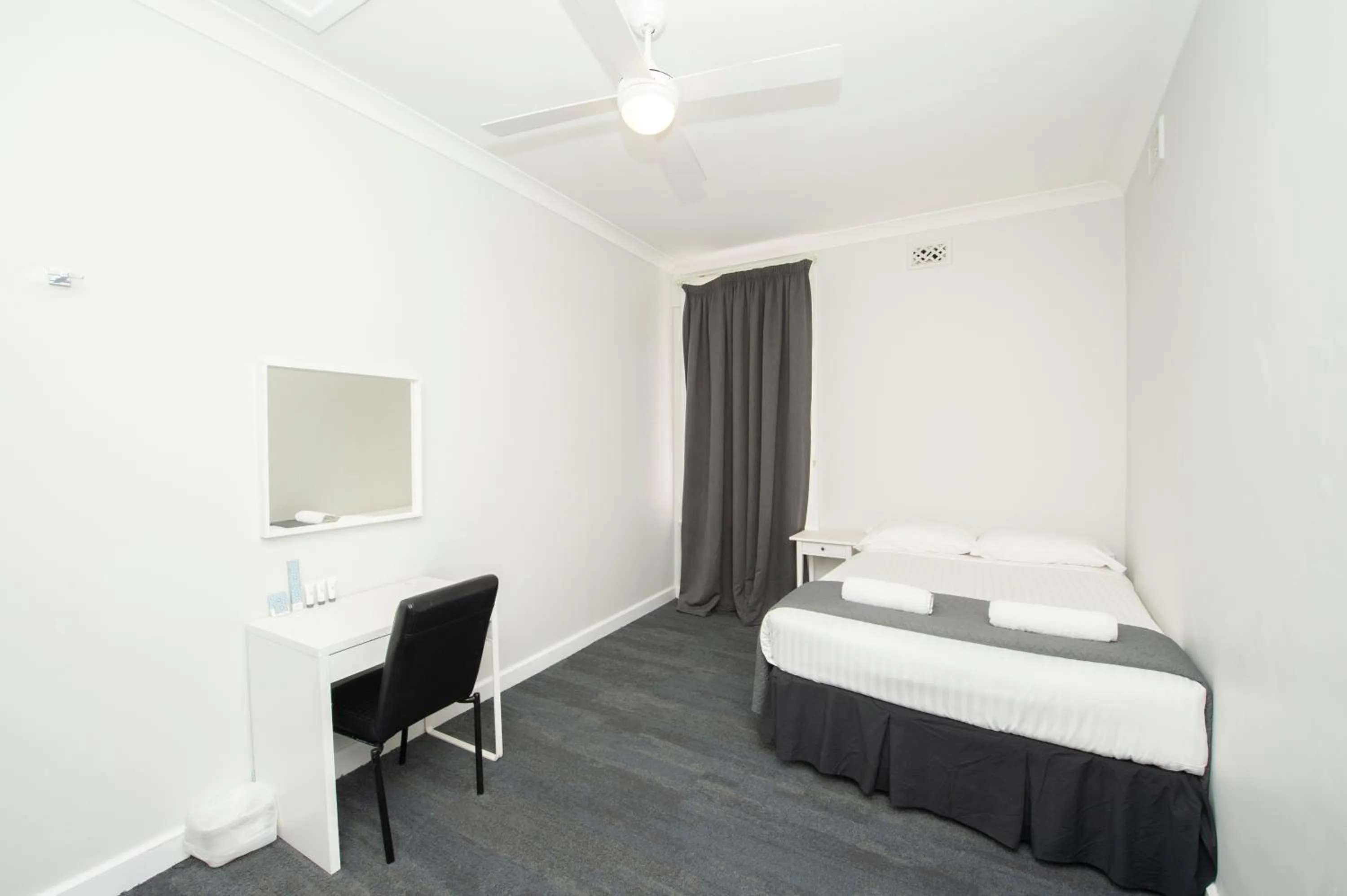 Bed in The Parade Hotel