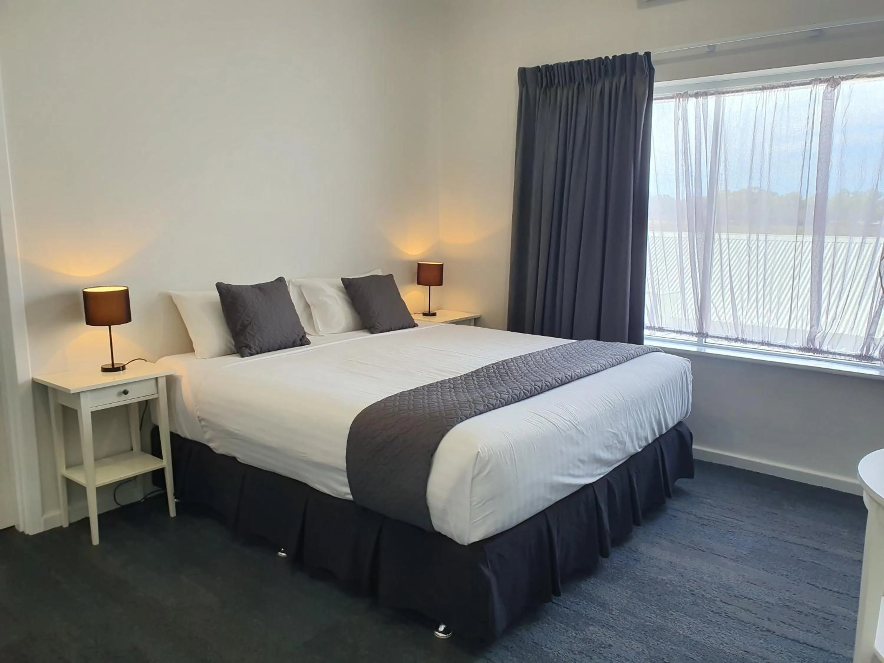 Bed in The Parade Hotel