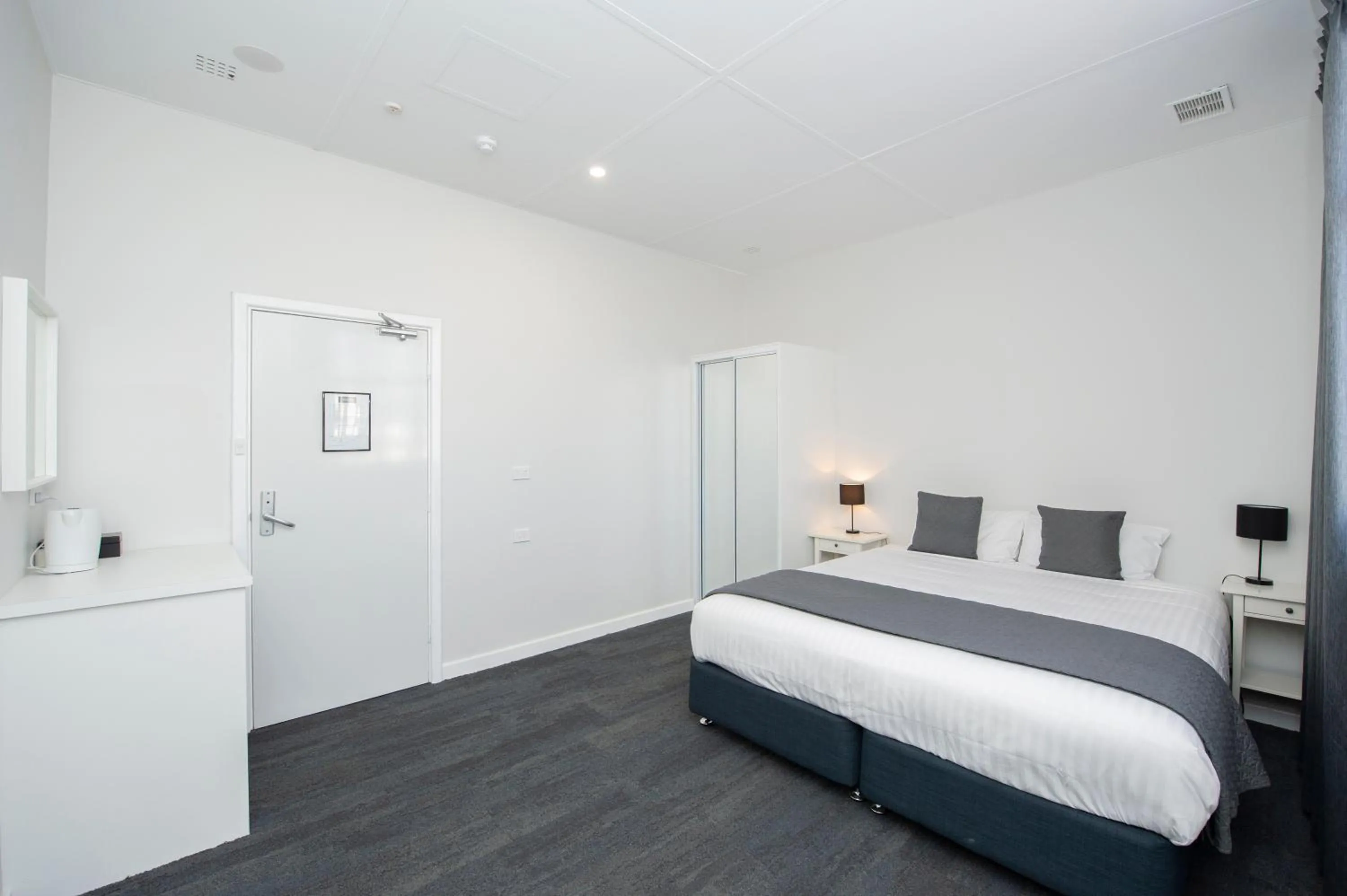 Bed in The Parade Hotel