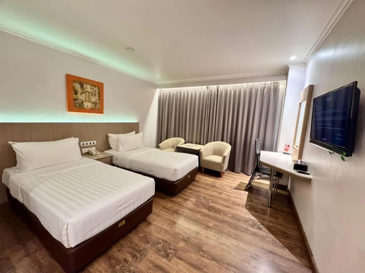 Bed in Orchardz Hotel Industri Jakarta Kemayoran