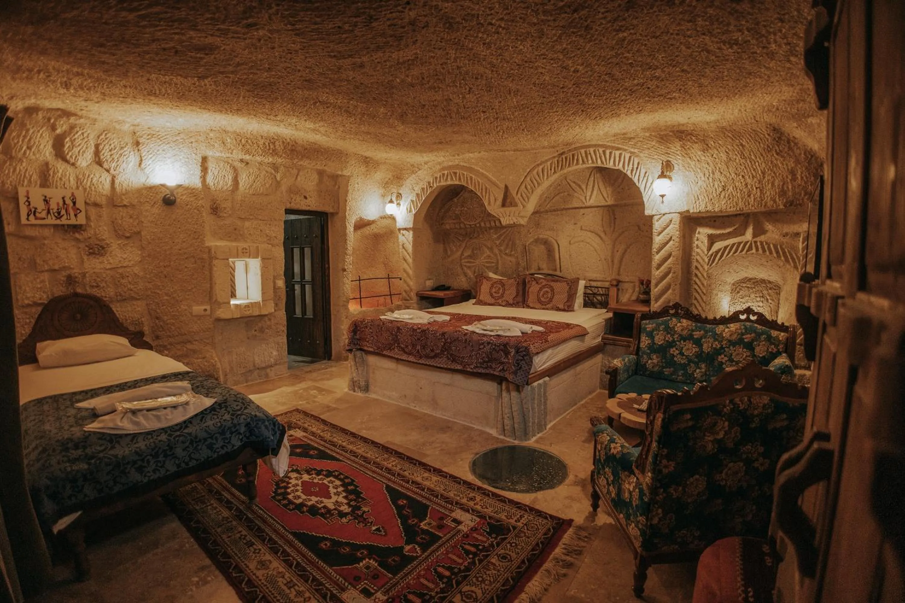 Bed in Vintage Cave House Hotel