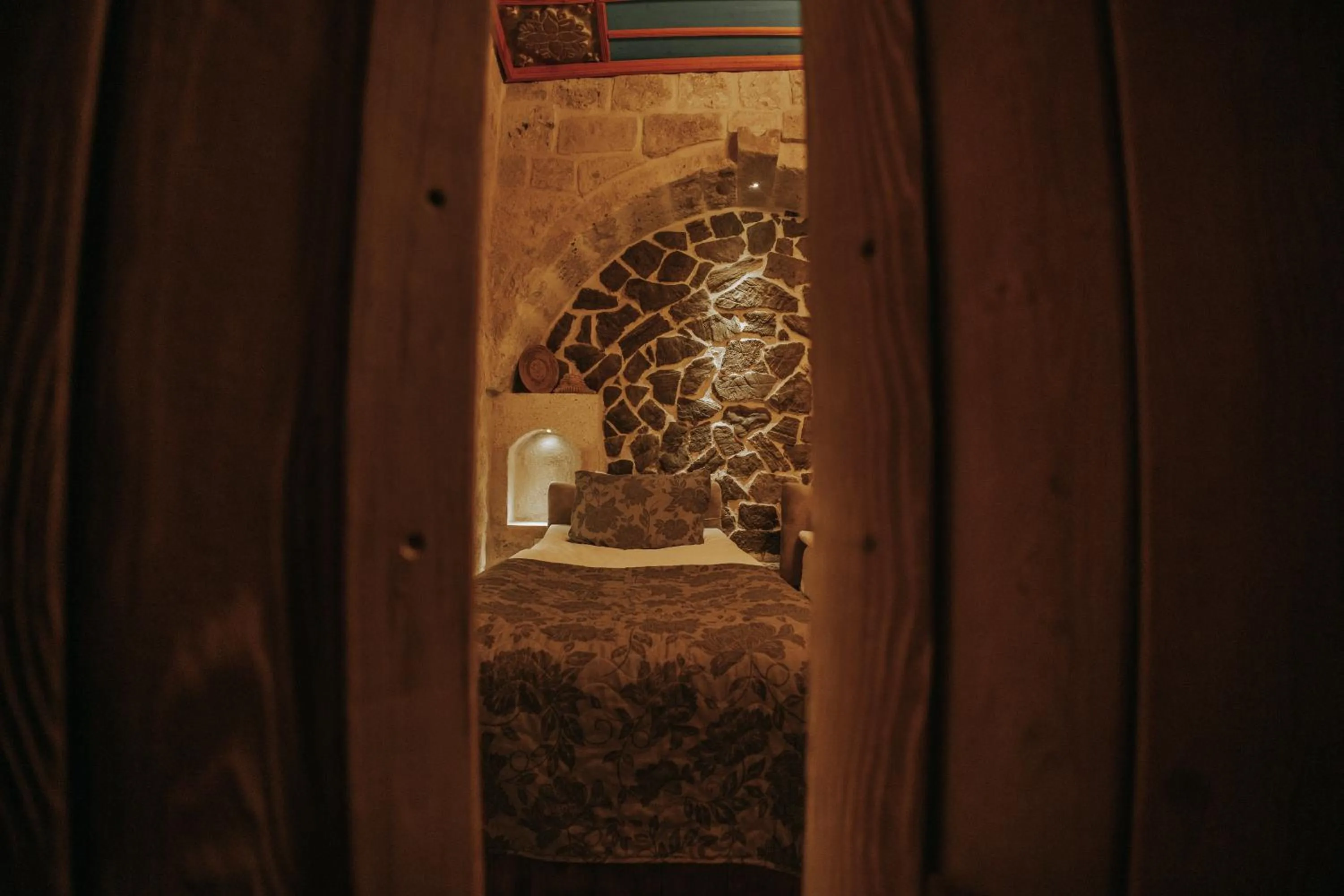 Bed in Vintage Cave House Hotel