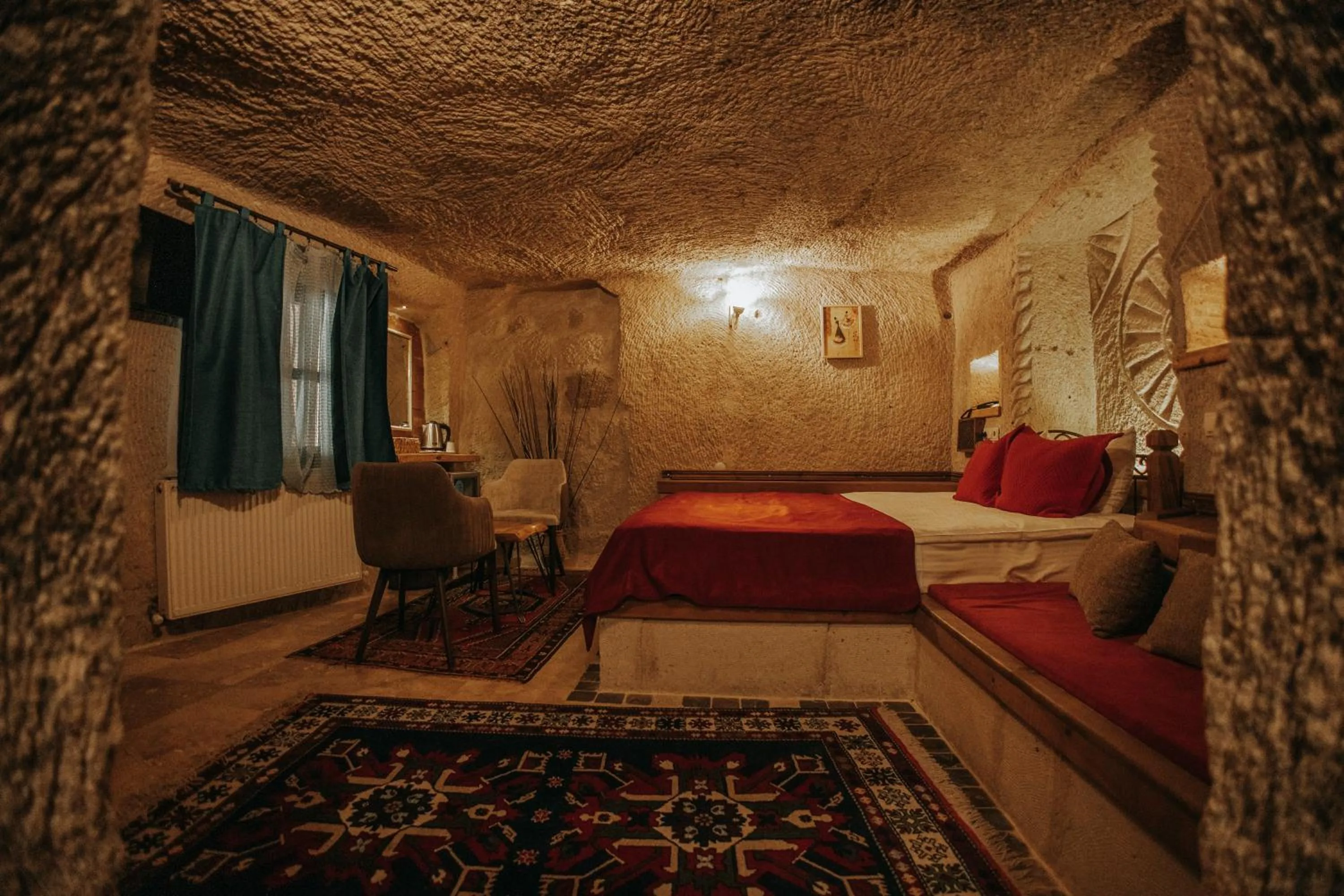 Bed in Vintage Cave House Hotel