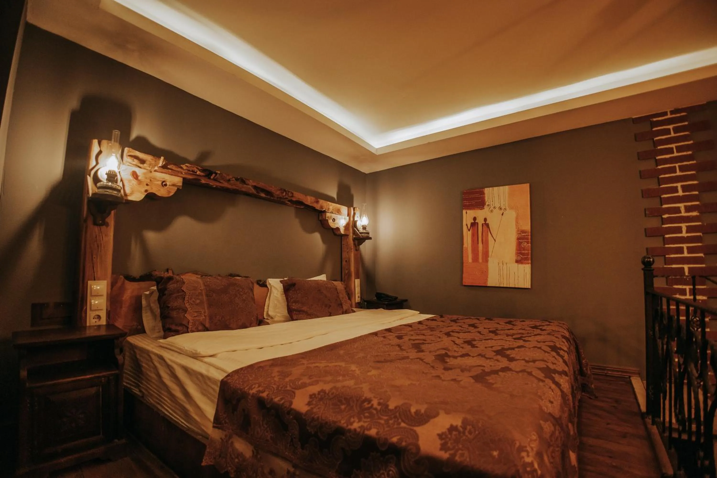 Bed in Vintage Cave House Hotel