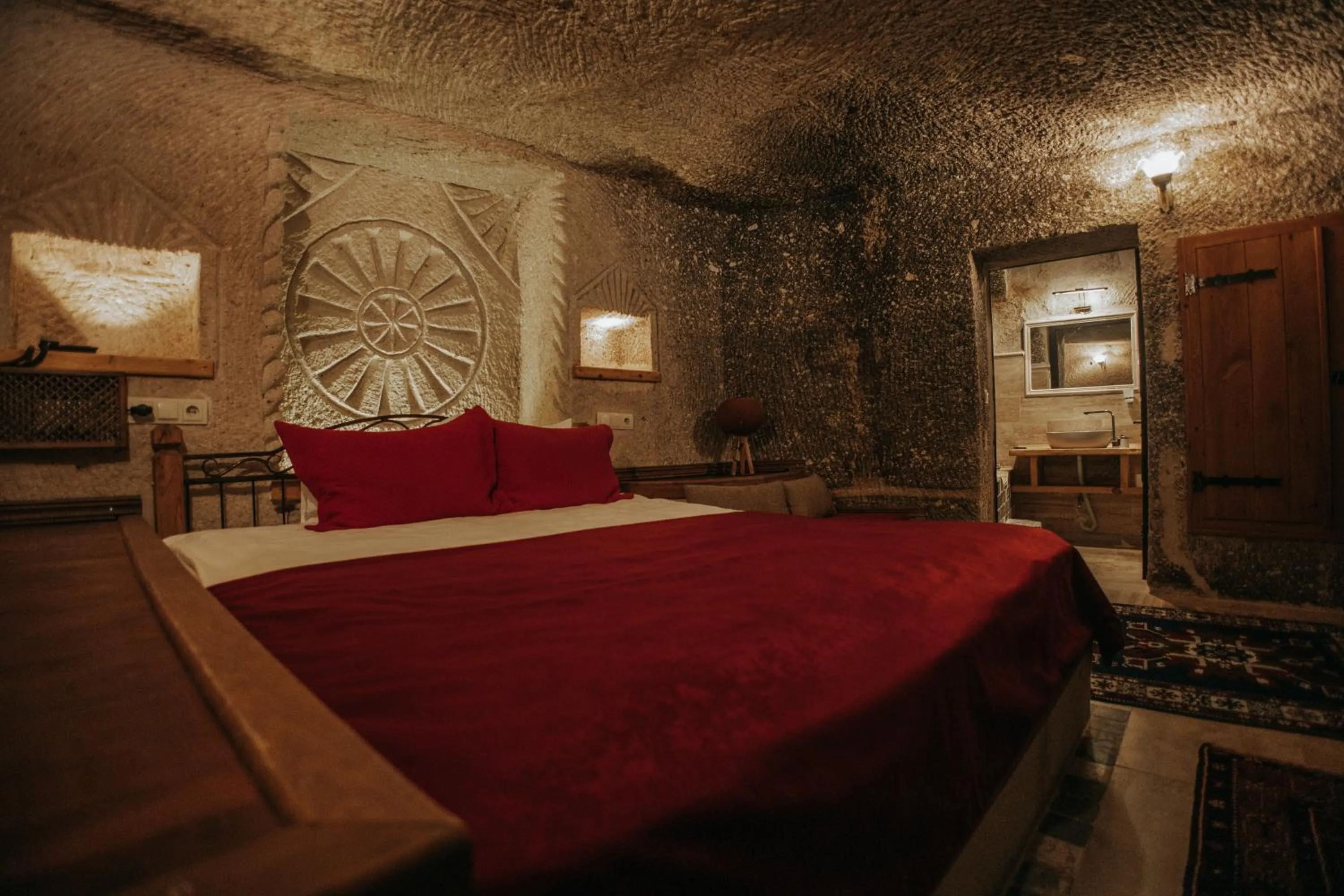 Bed in Vintage Cave House Hotel