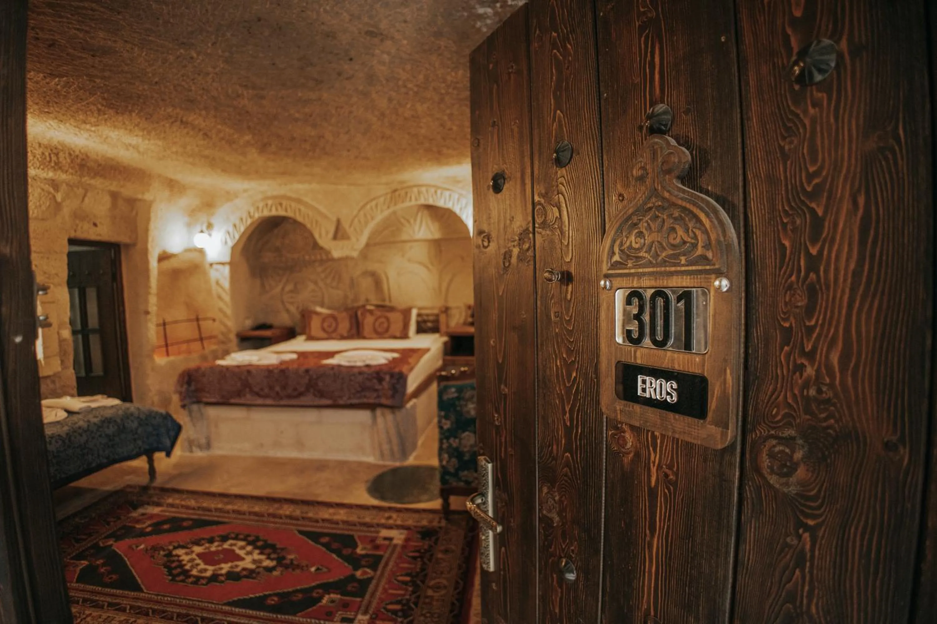 Bed in Vintage Cave House Hotel