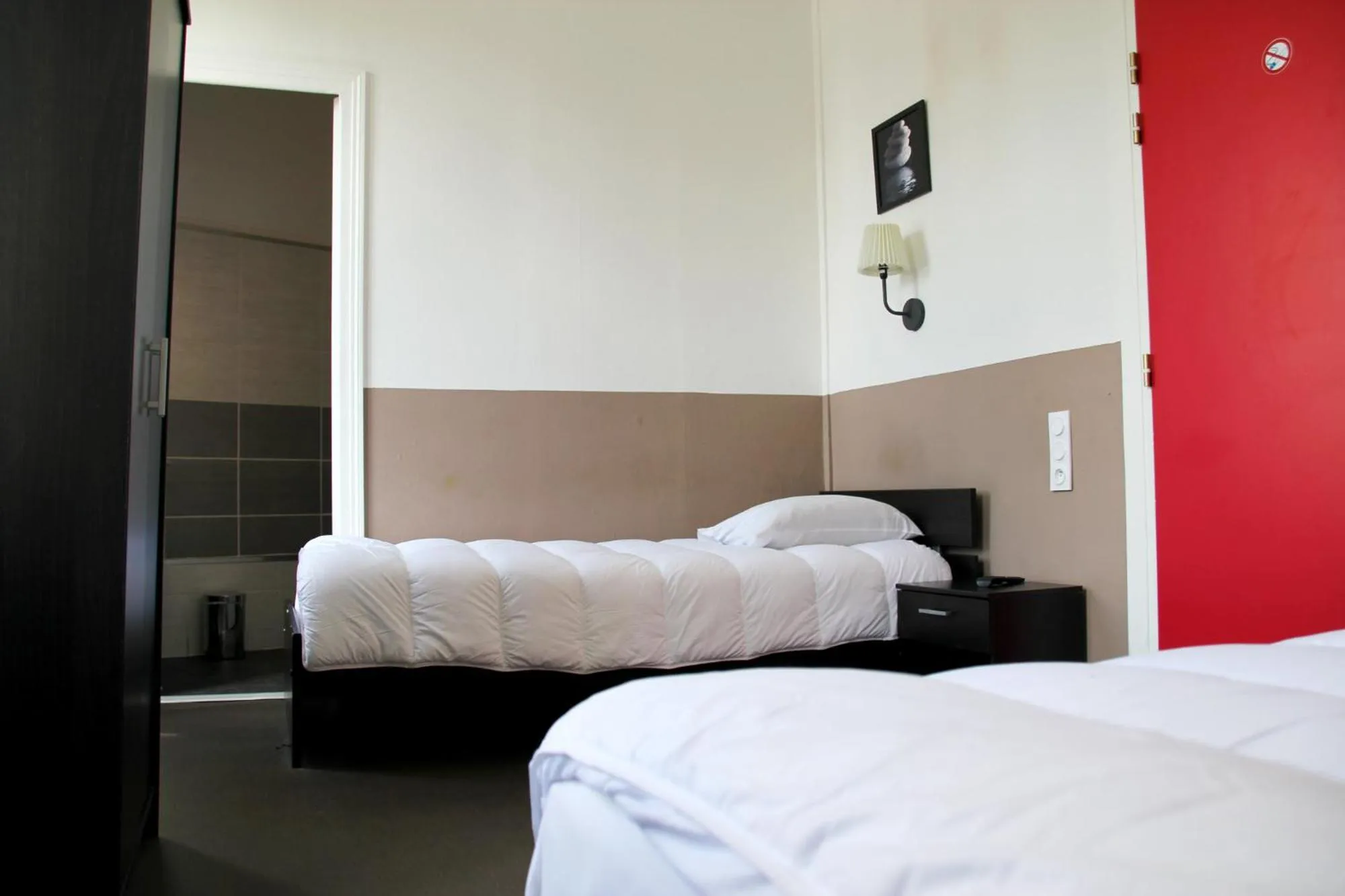 Bed in Hôtel de France