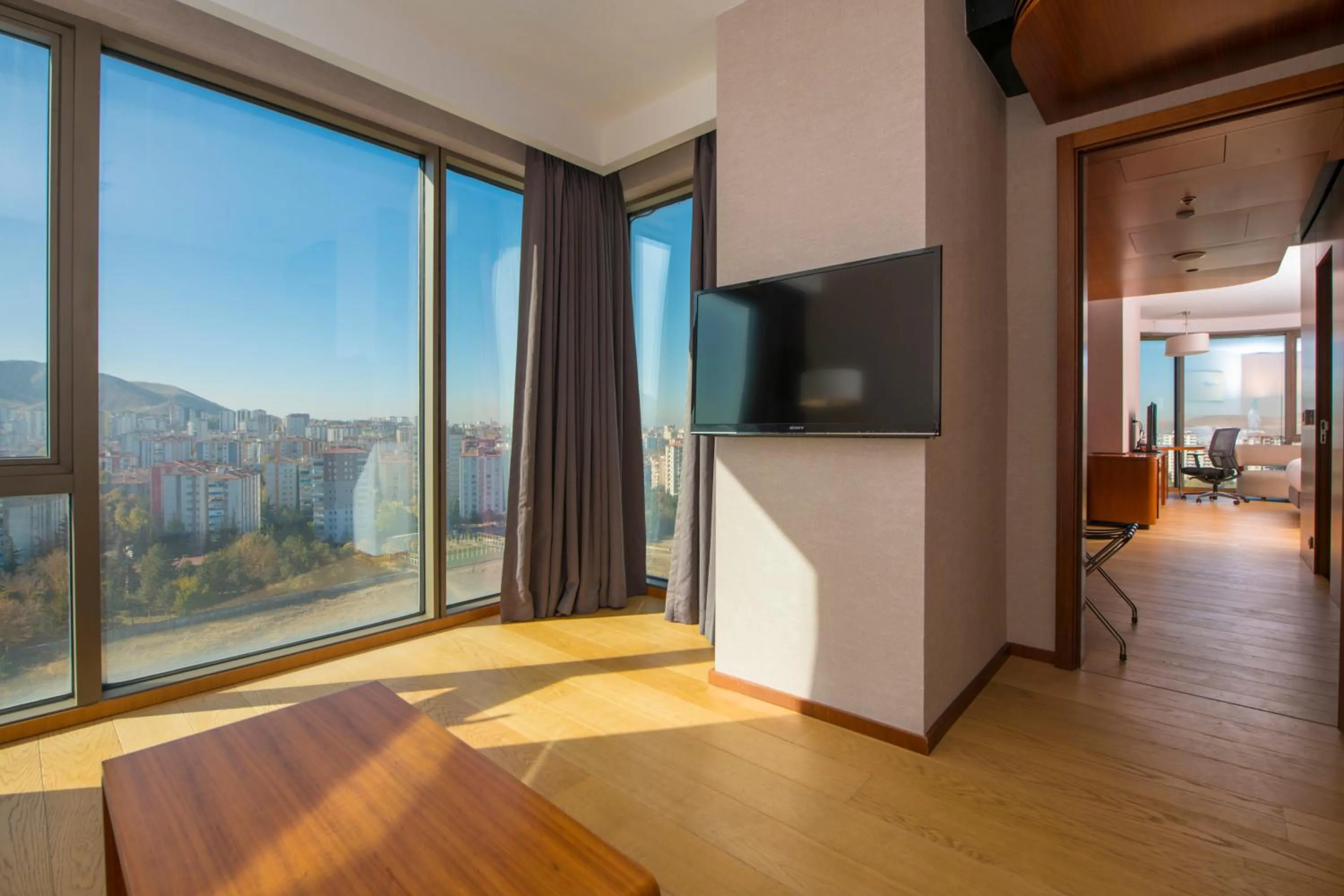 Communal lounge/ TV room in Crowne Plaza Kayseri by IHG