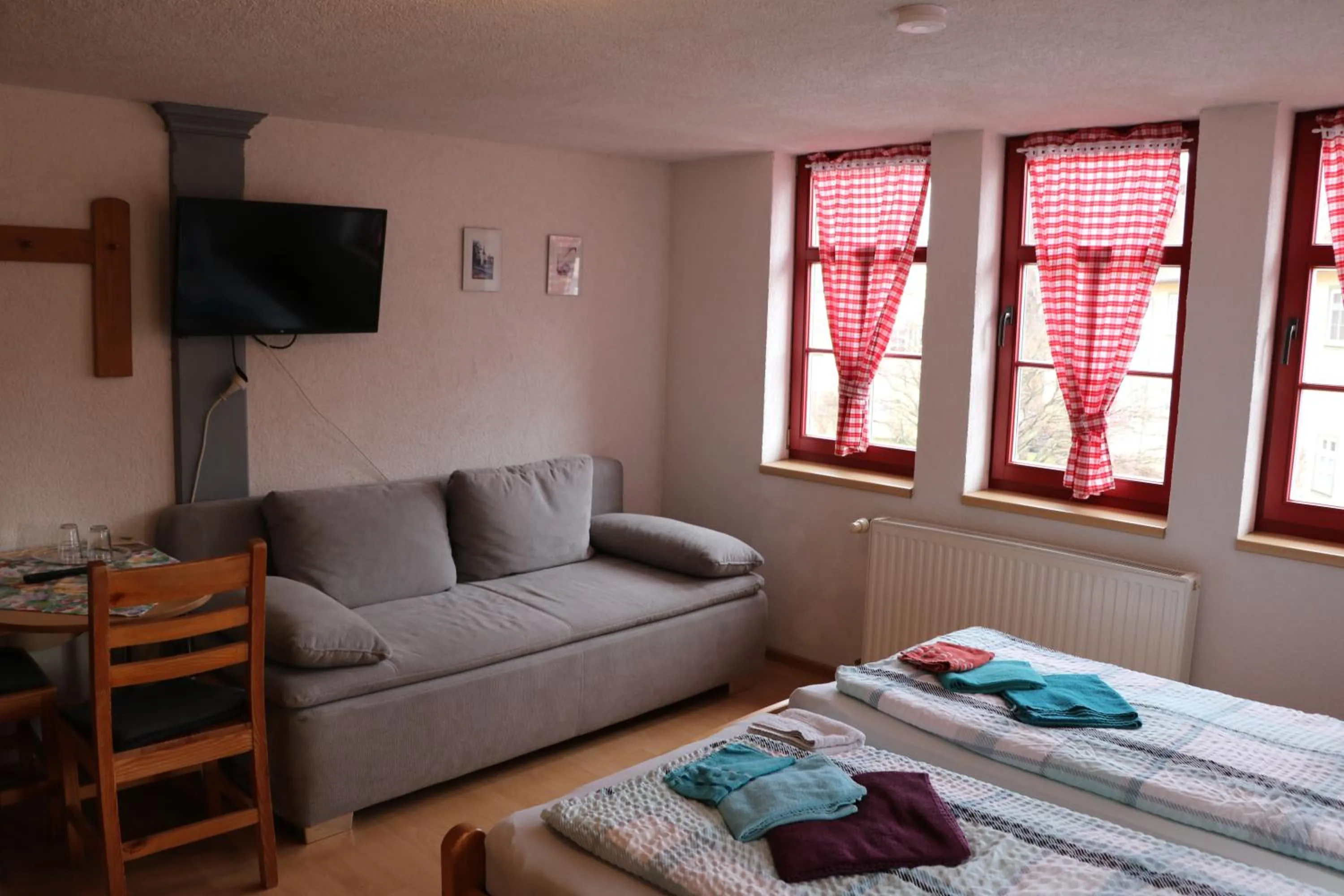 Photo of the whole room, Bed in Gasthaus Zur Weintraube