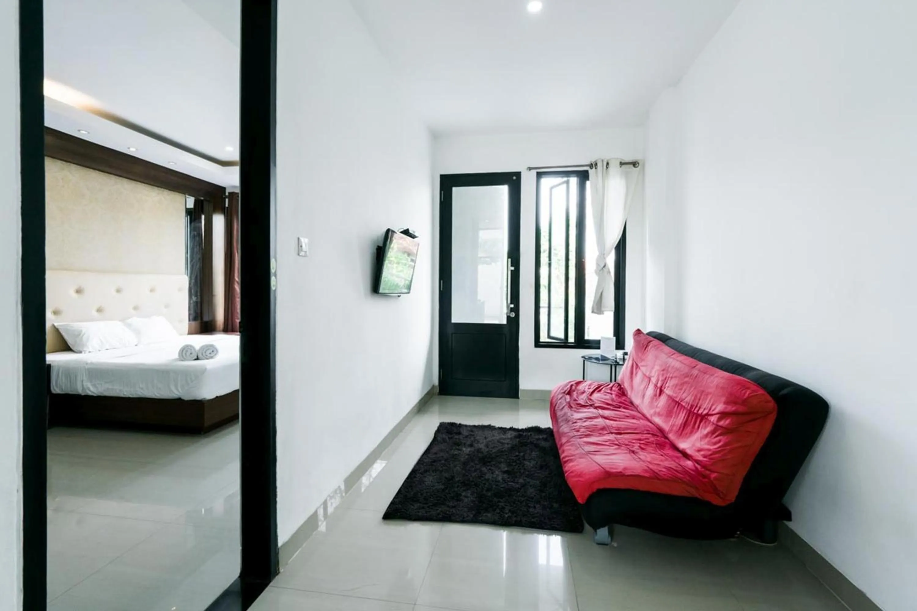 Seating area, Bed in Townhouse Sanur