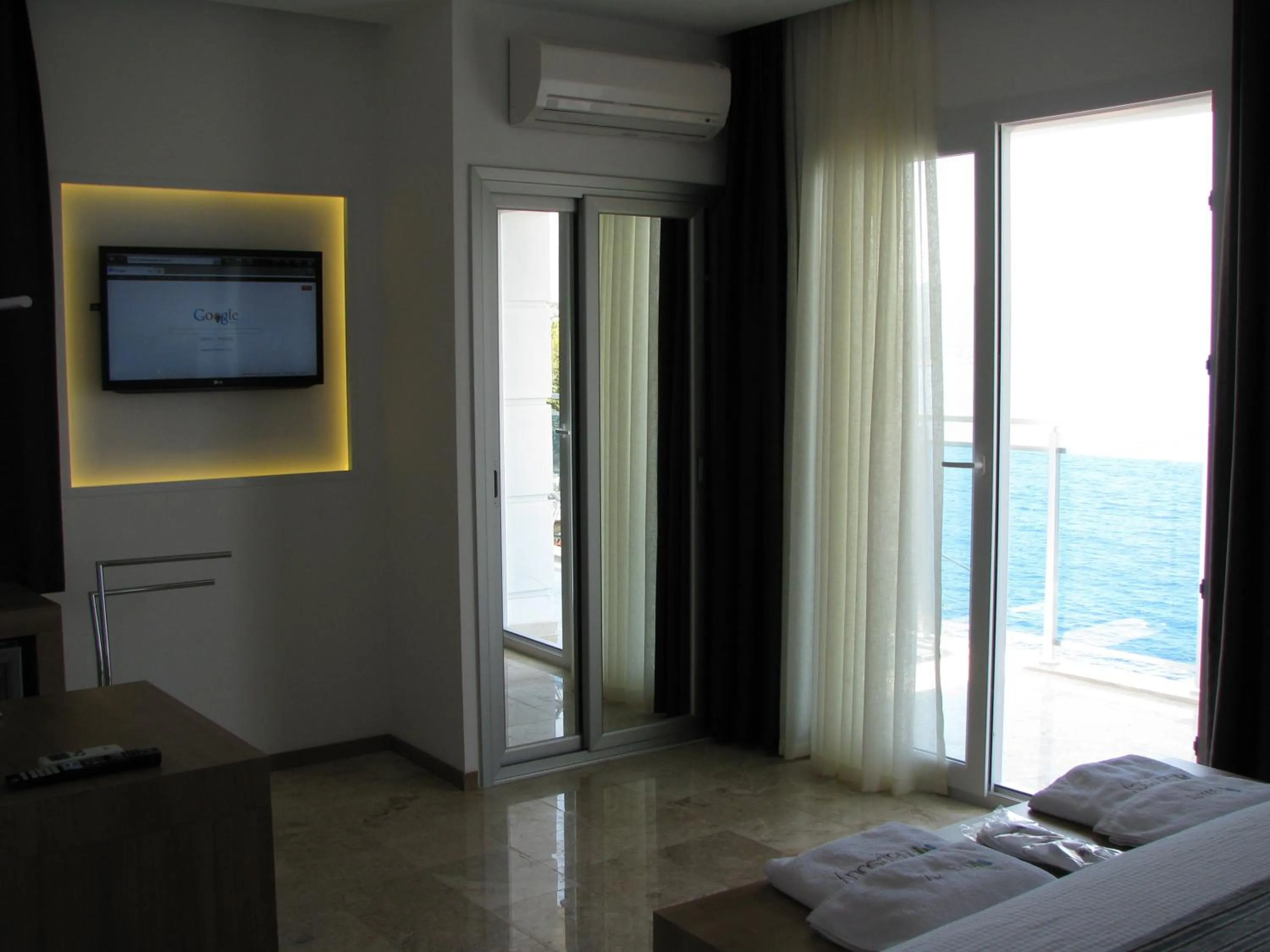 Photo of the whole room, Bed in Rhapsody Hotel Kas