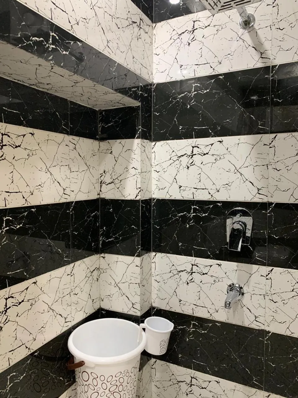 Bathroom in Hotel Kabir Residency