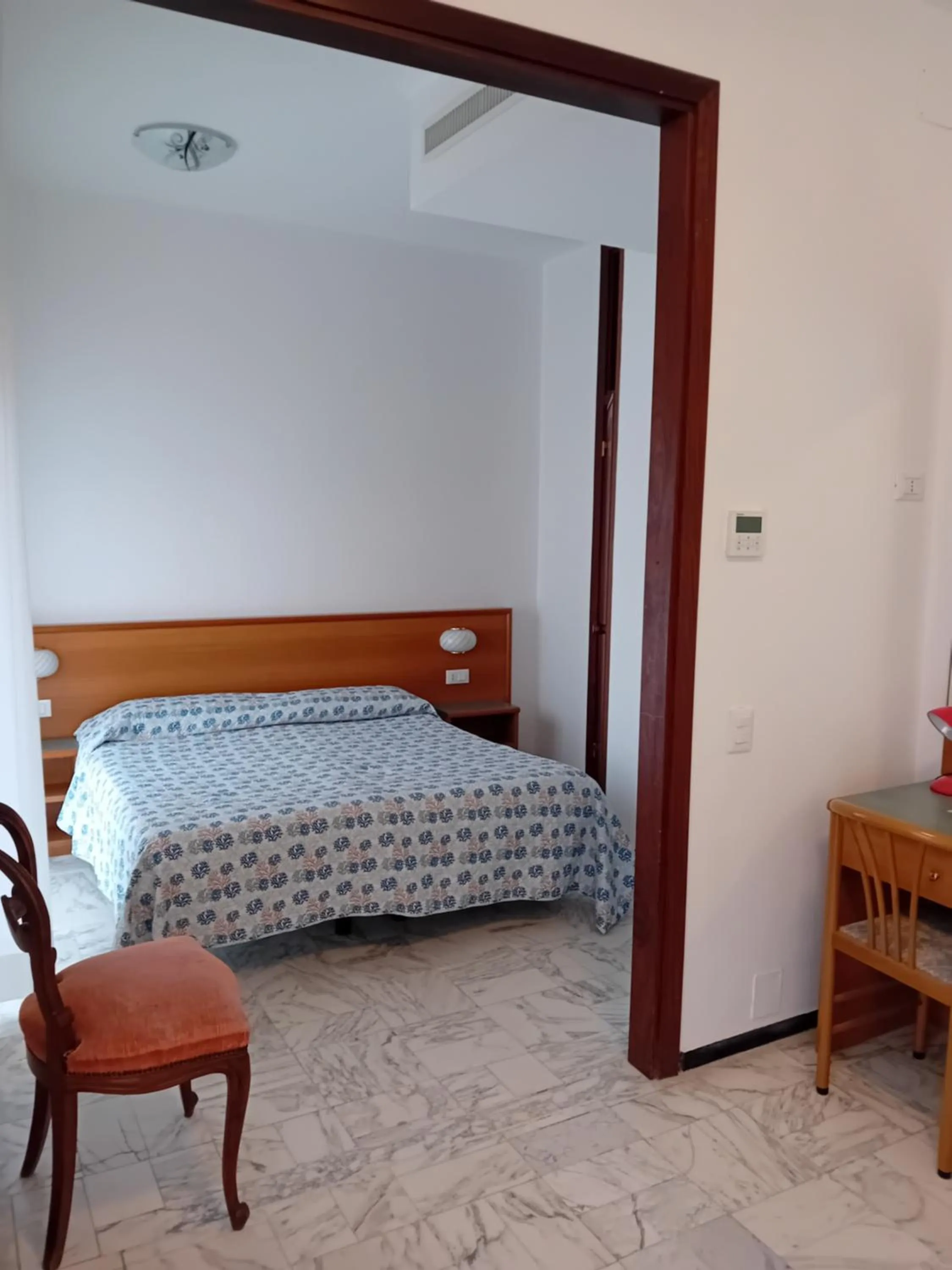 Bed in Hotel Valentino