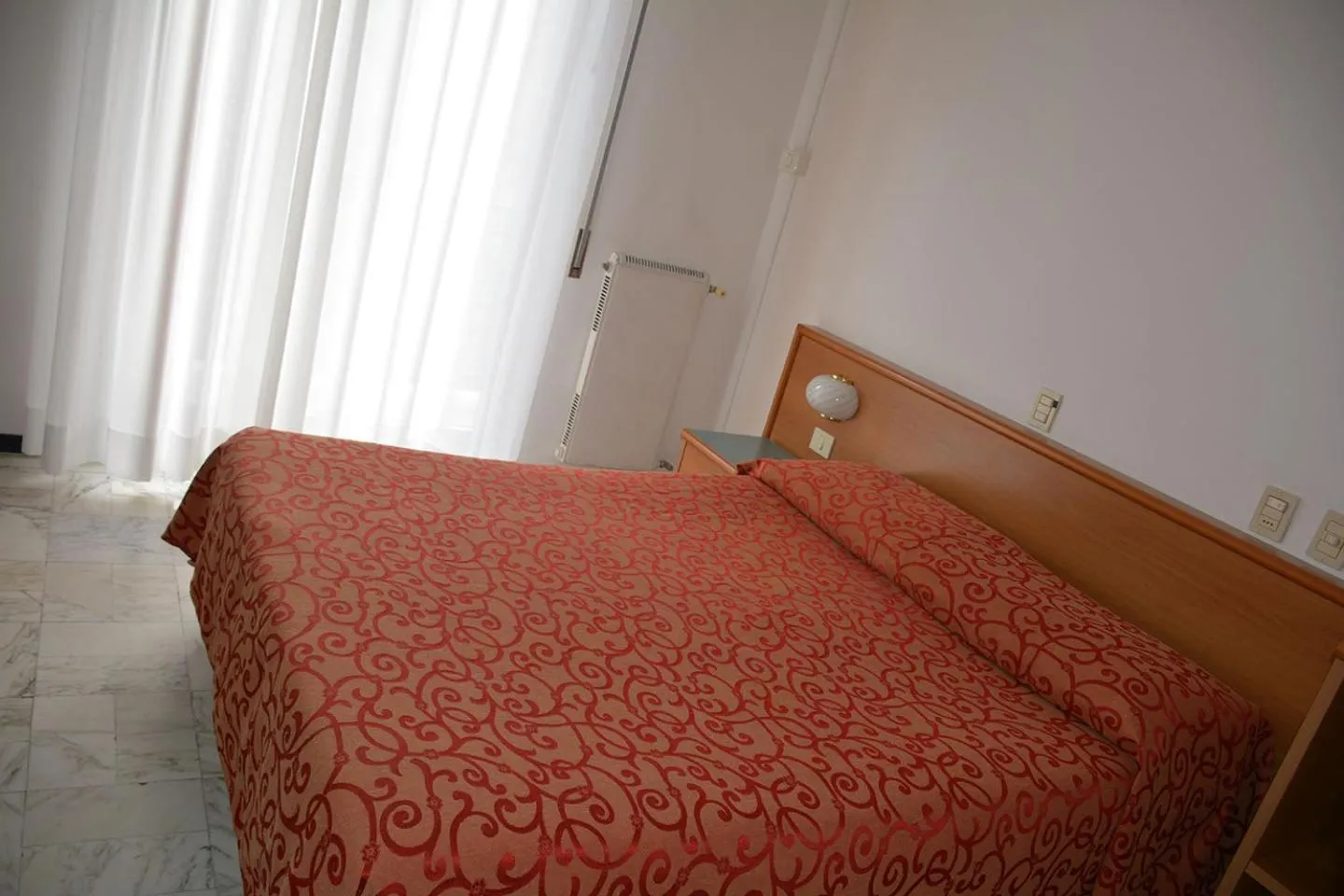 Bed in Hotel Valentino