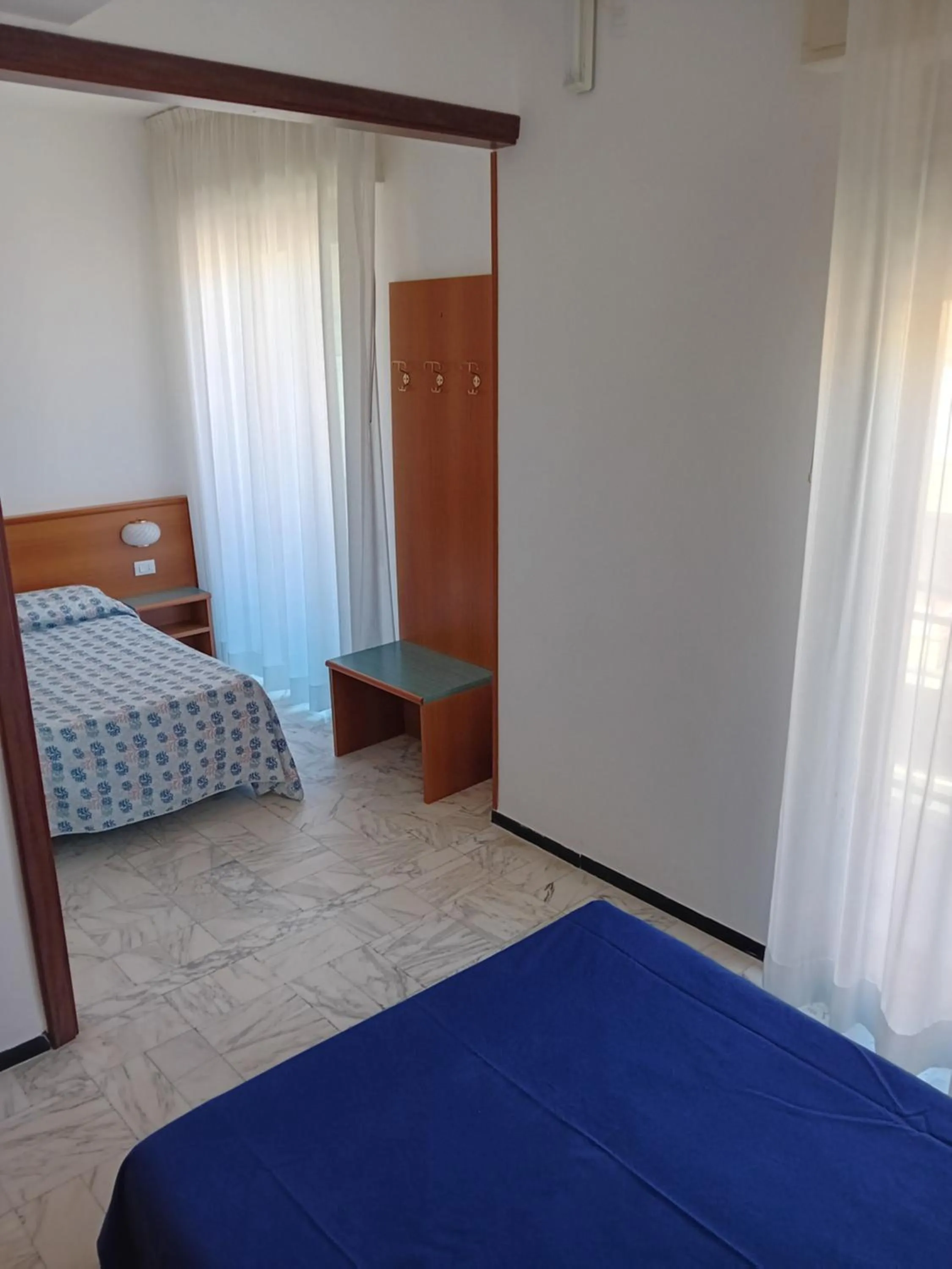 Bed in Hotel Valentino