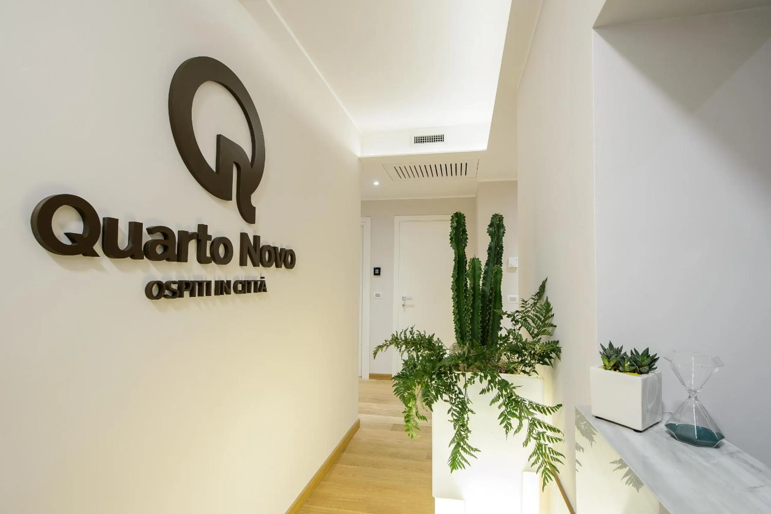 Property logo or sign in Quarto Novo Suite