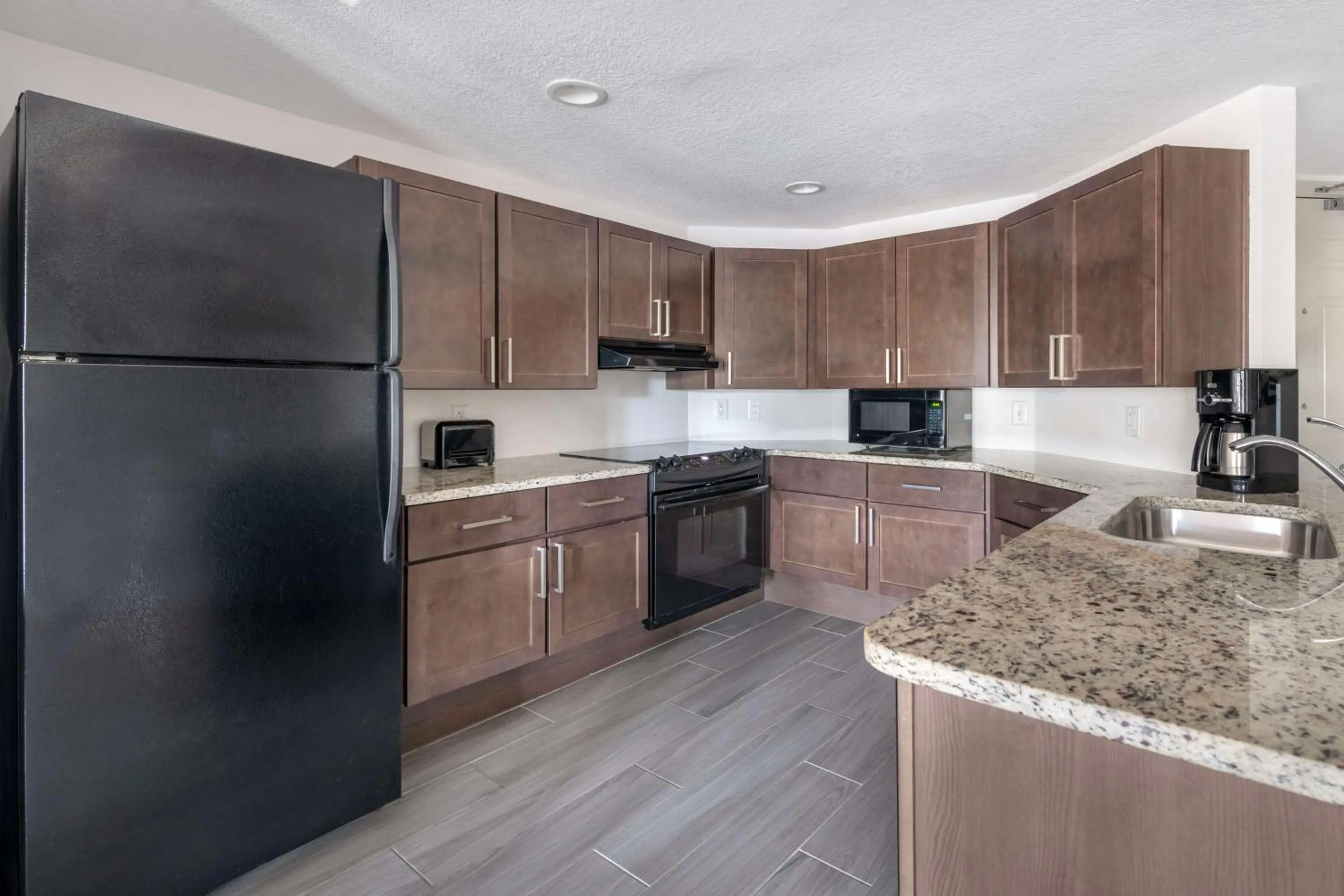 Kitchen or kitchenette in Hilton Vacation Club Aqua Sol Orlando West