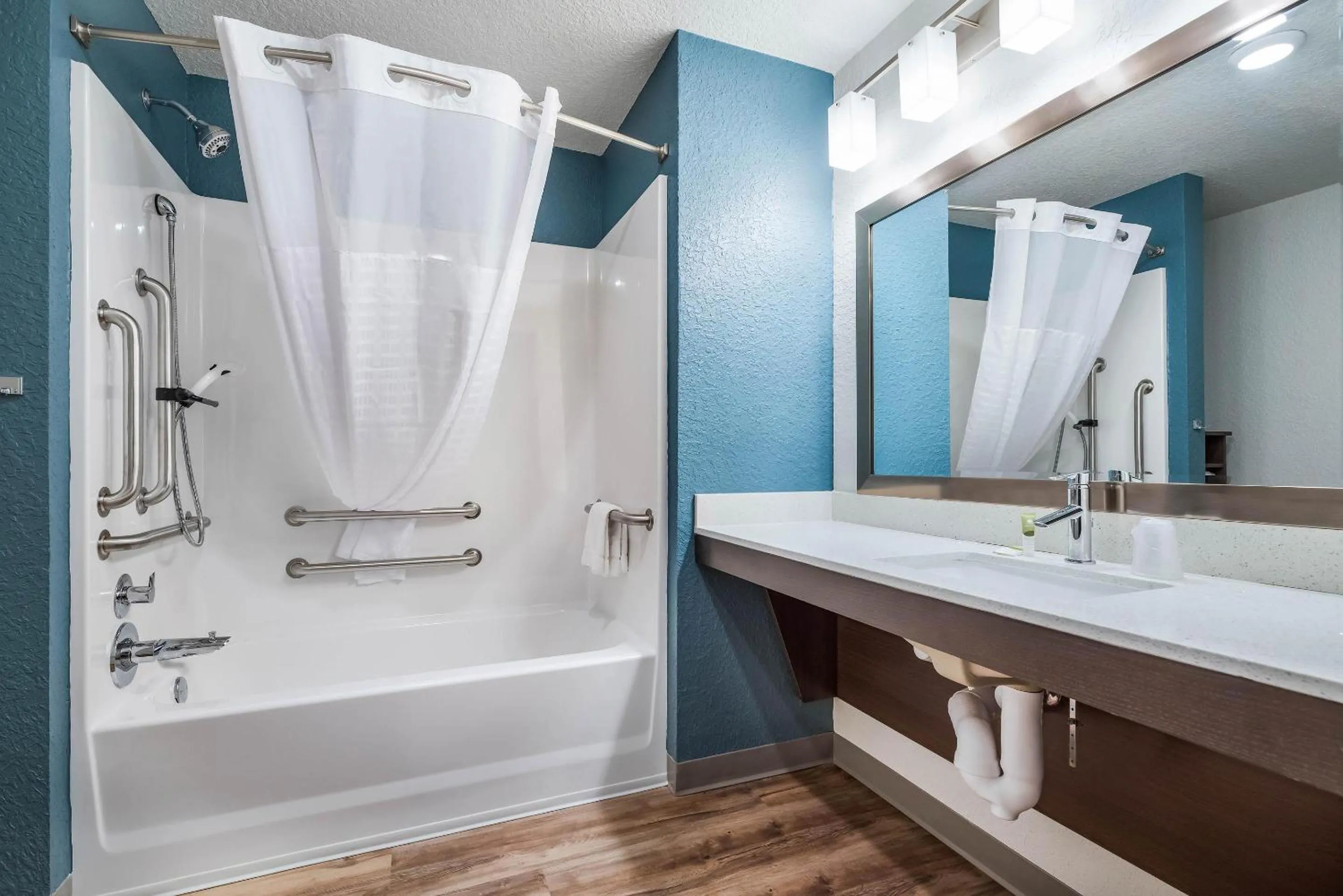 Bedroom in WoodSpring Suites Davenport FL