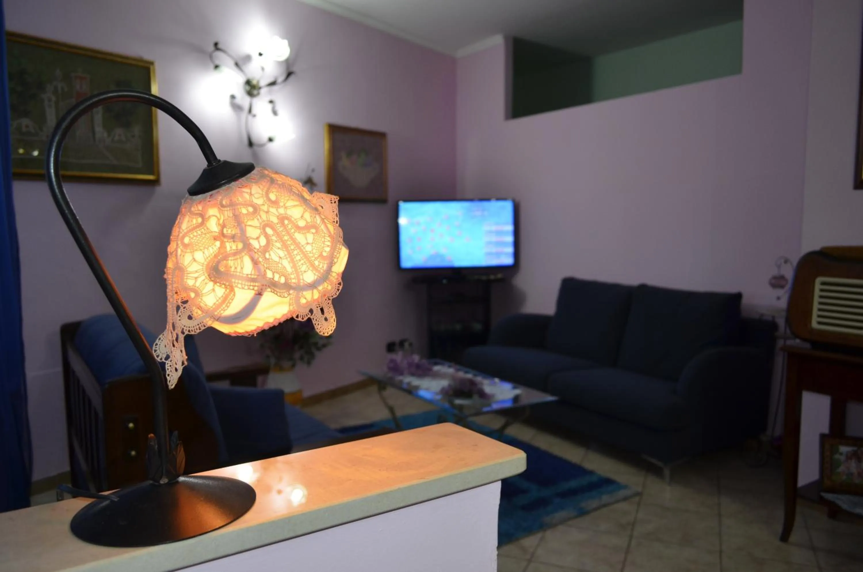 Communal lounge/ TV room in B&B Le Colonne