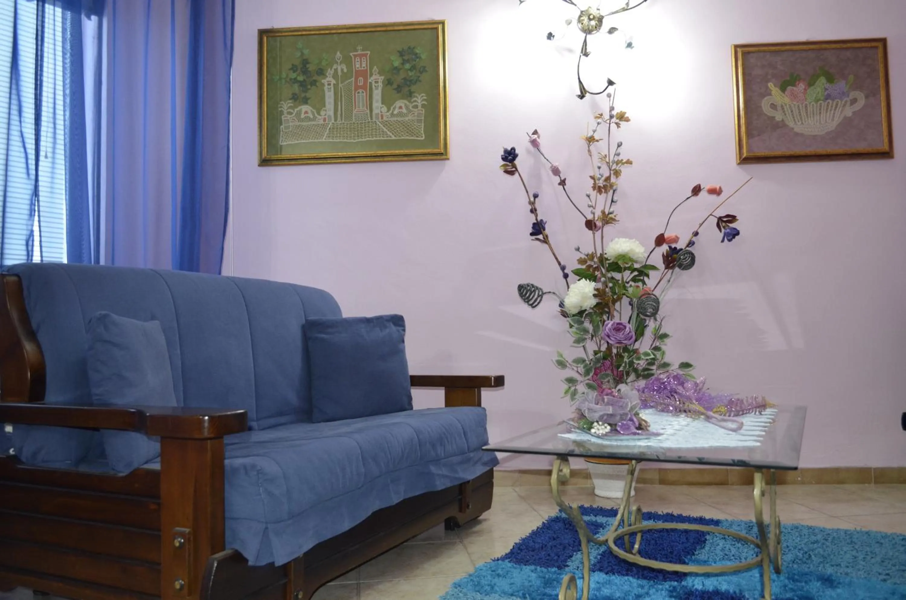 Communal lounge/ TV room in B&B Le Colonne