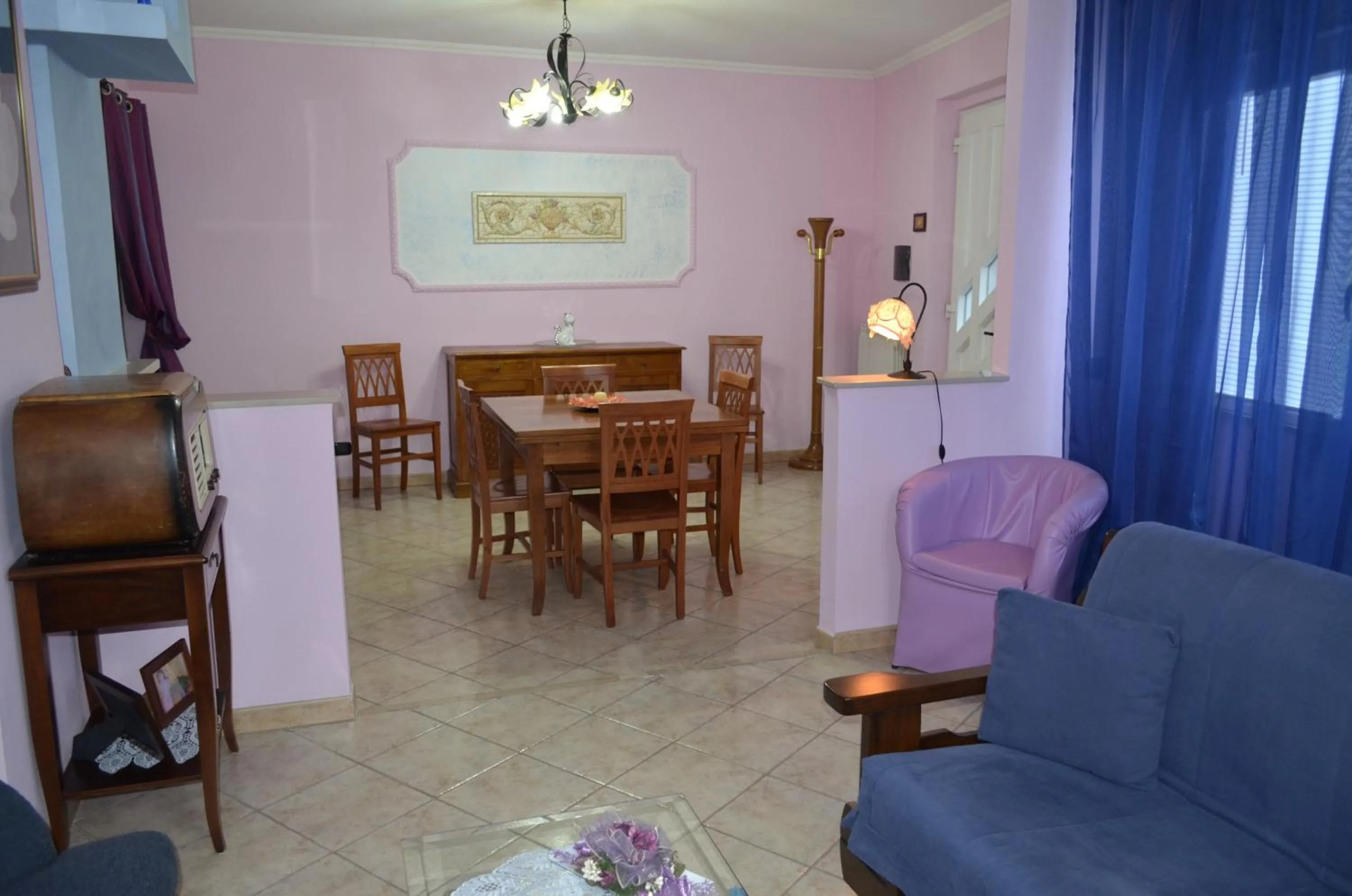 Communal lounge/ TV room in B&B Le Colonne