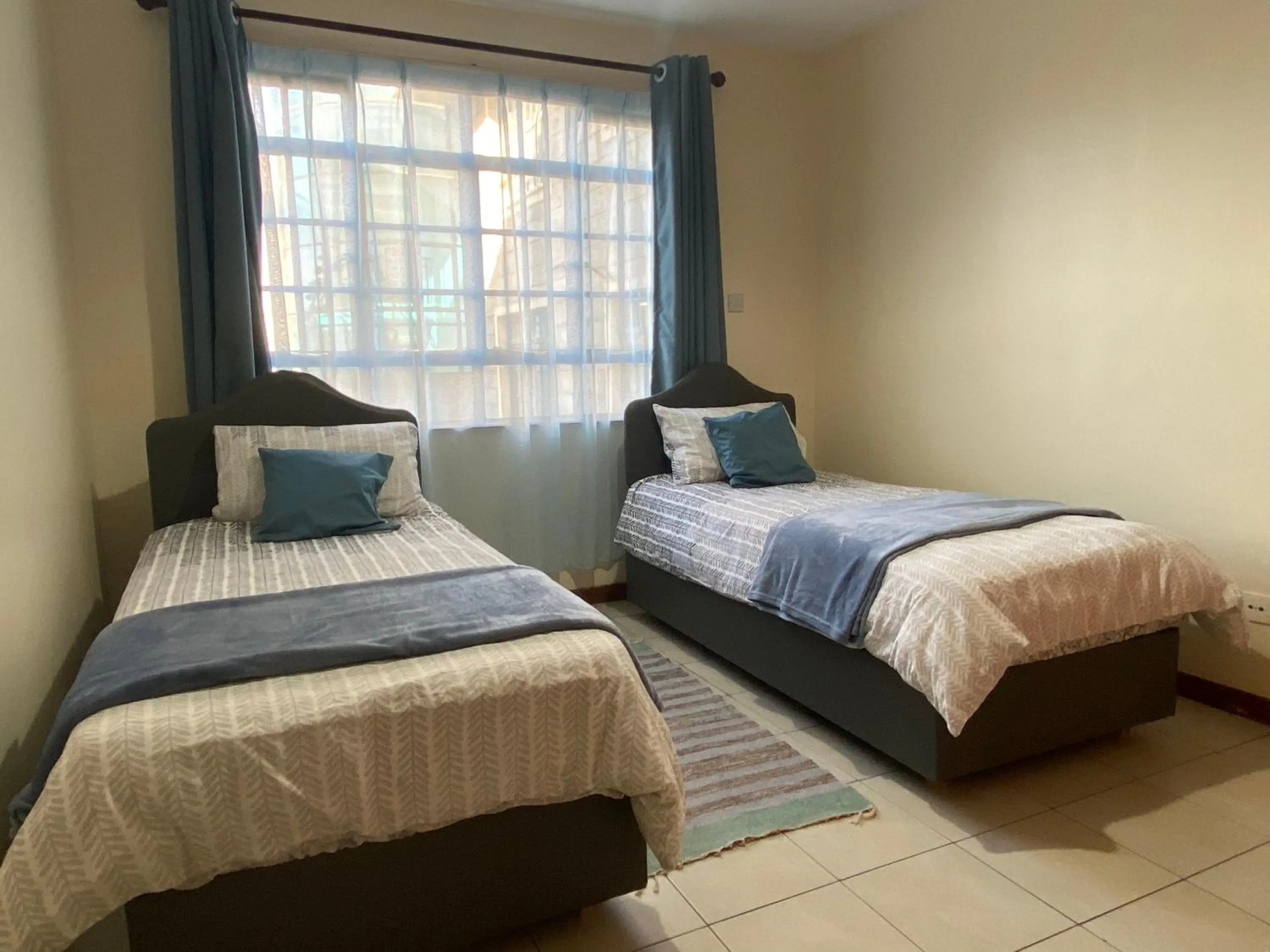 Photo of the whole room, Bed in Takdiri Homes