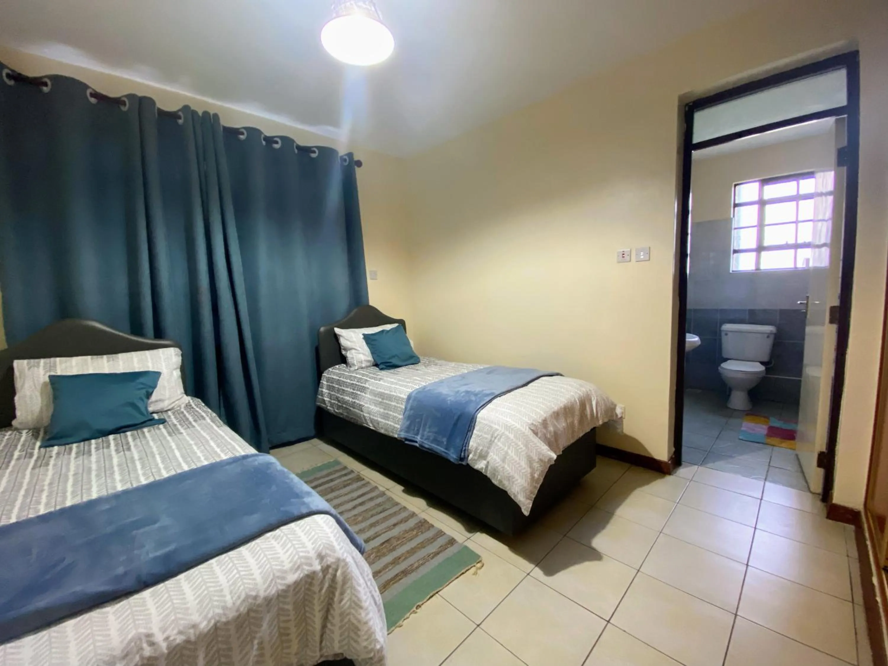 Photo of the whole room, Bed in Takdiri Homes