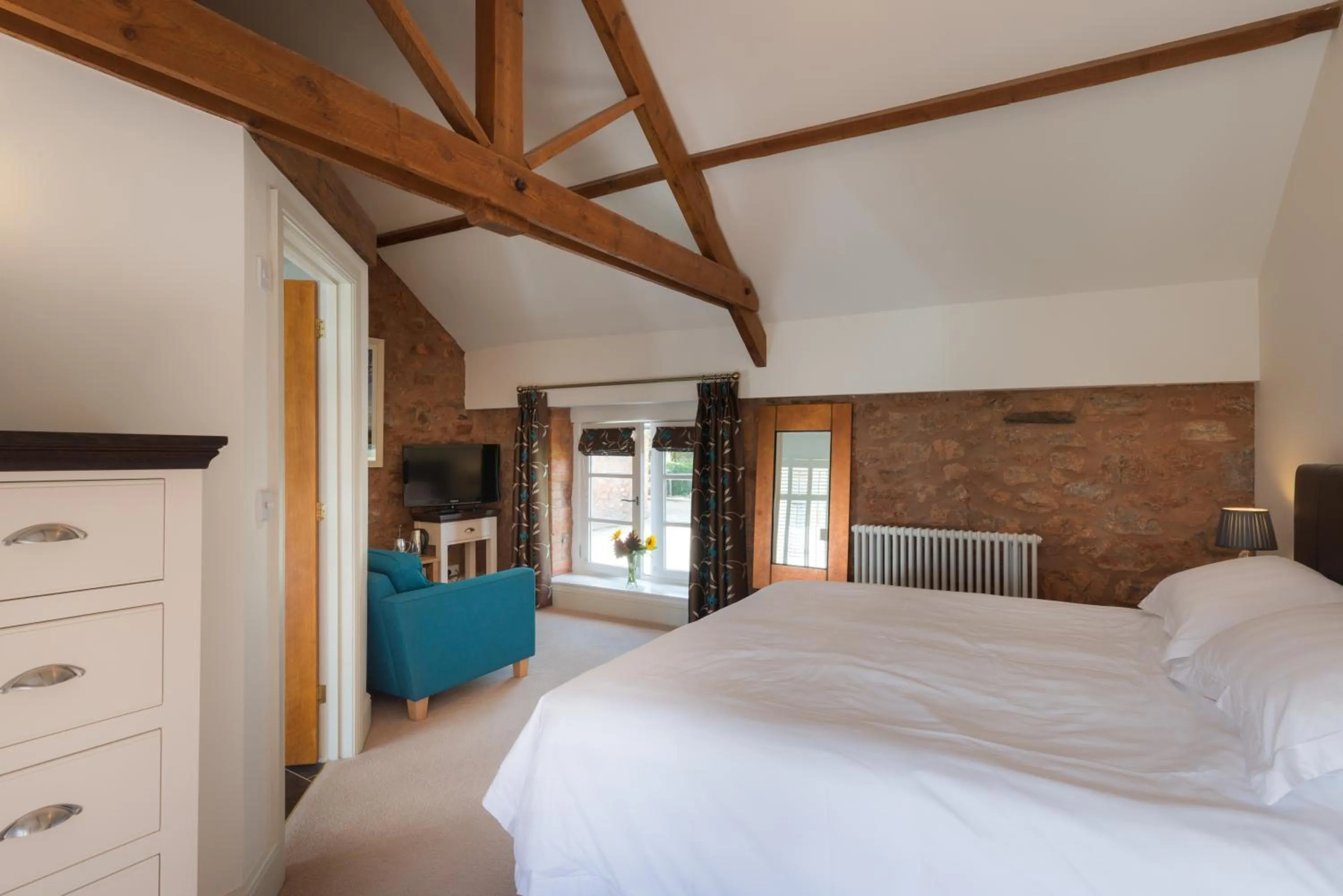 Photo of the whole room, Bed in The Old Dairy at Bishops Barton
