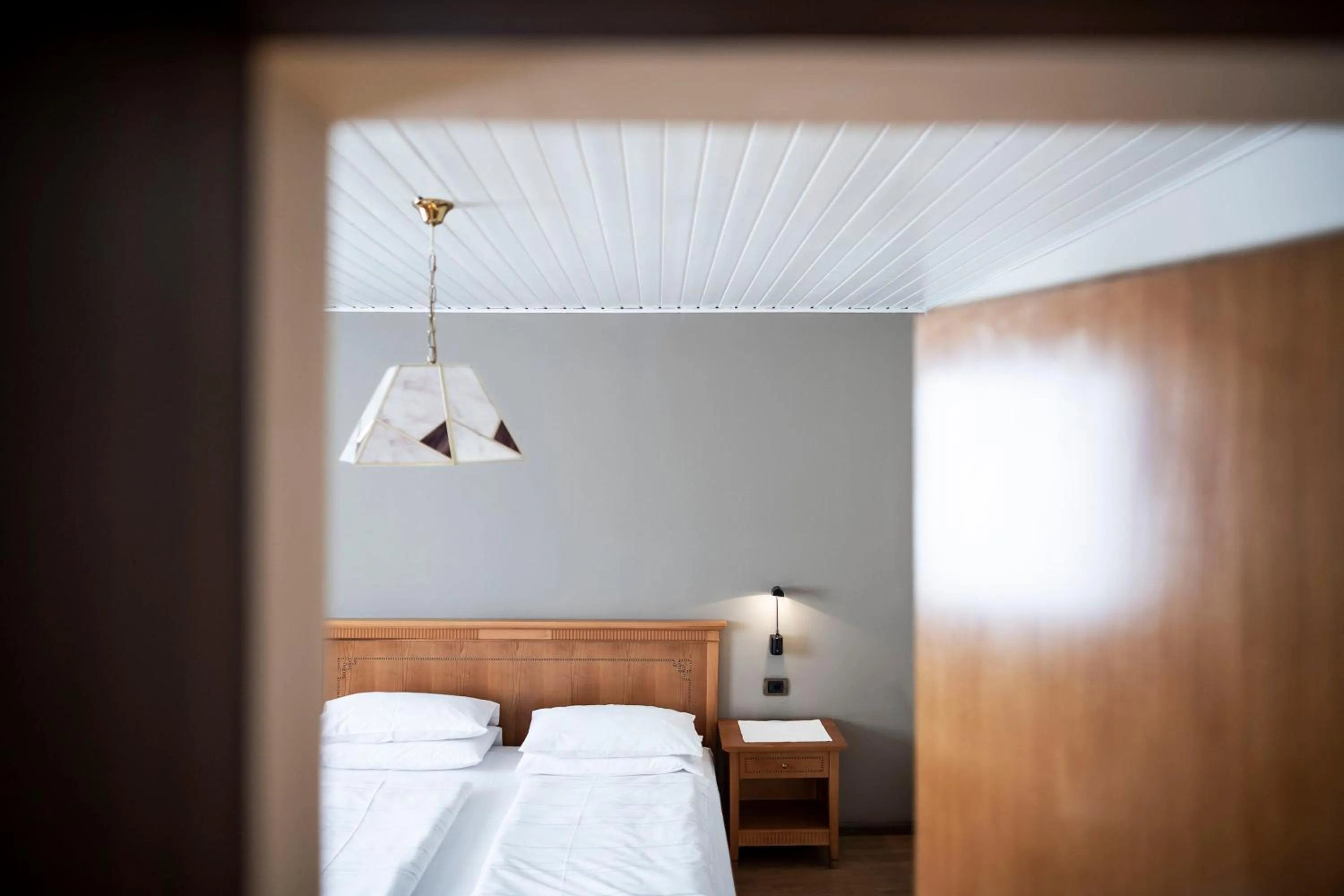 Photo of the whole room, Bed in Post Residence