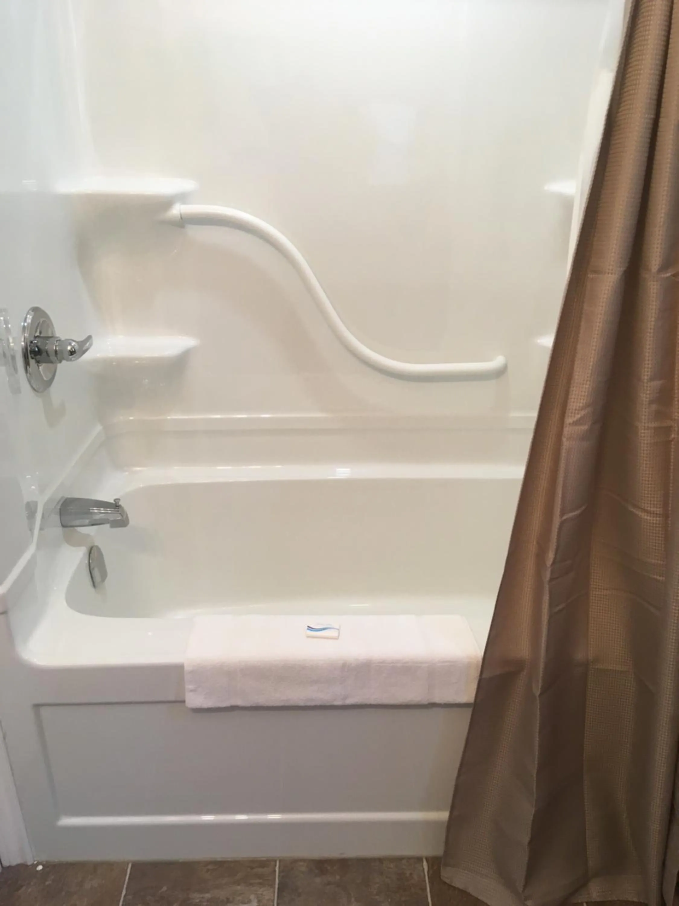 Shower in Baywatch Lighthouse Cottages & Motel