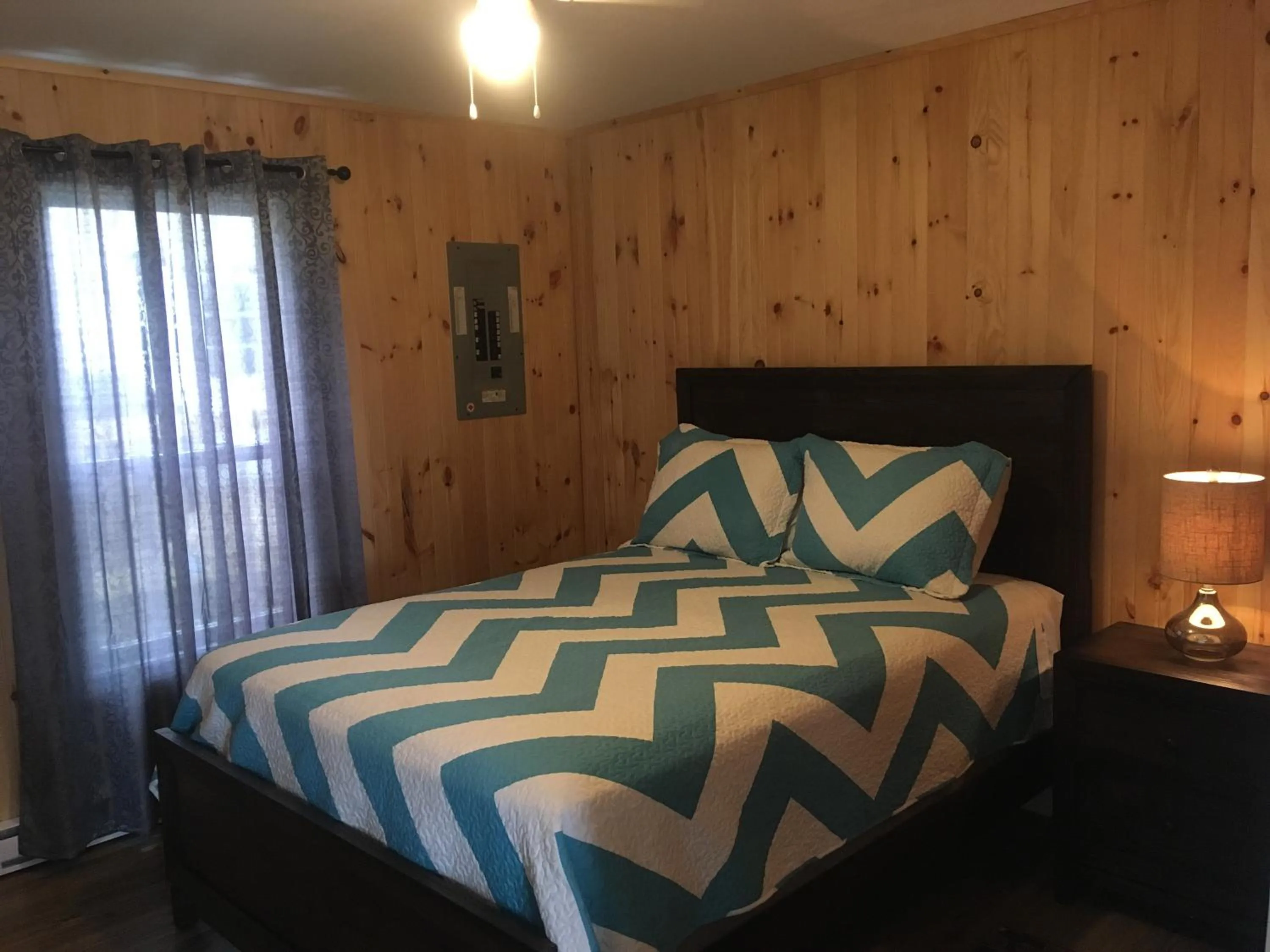 Bed in Baywatch Lighthouse Cottages & Motel