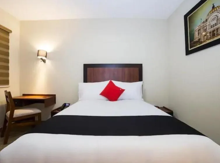 Bed in Hotel Colonial Acopinalco Inn