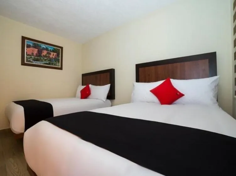 Bed in Hotel Colonial Acopinalco Inn