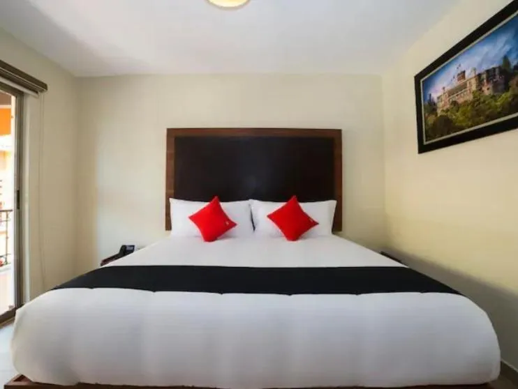 Bed in Hotel Colonial Acopinalco Inn