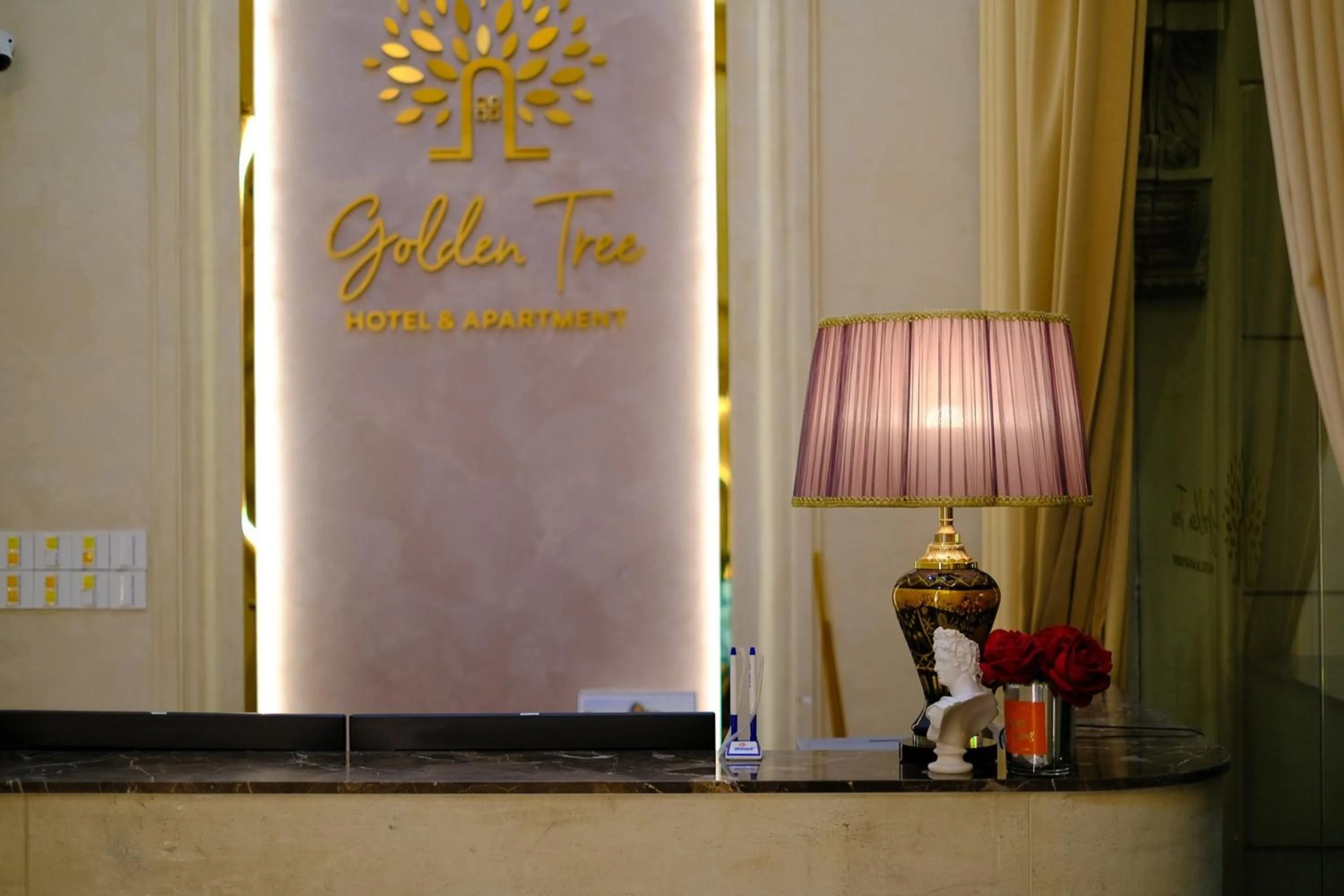 Property logo or sign in Golden Tree Hotel & Apartment