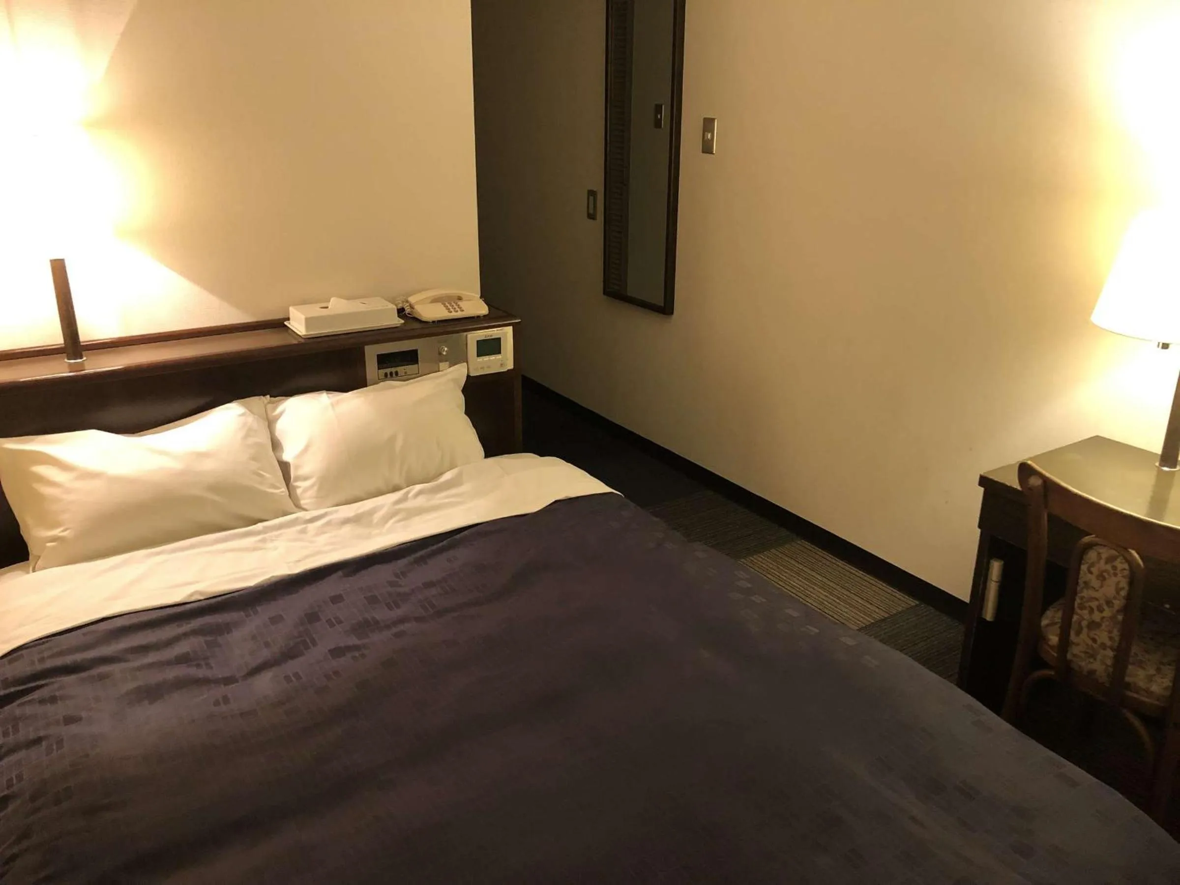 Bed in Hotel Welcome Matsumoto