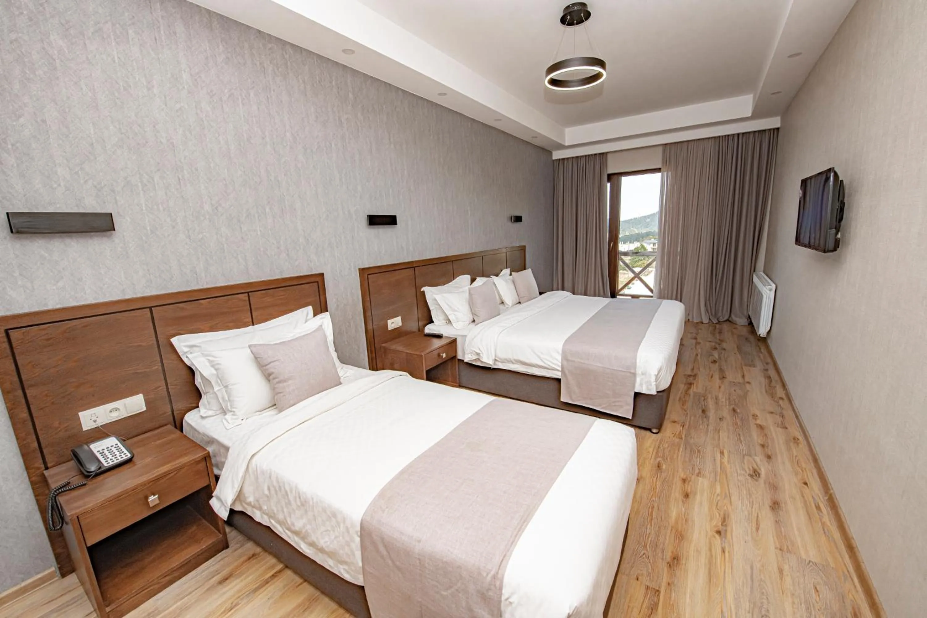 Bed in Crystal Hotel & SPA