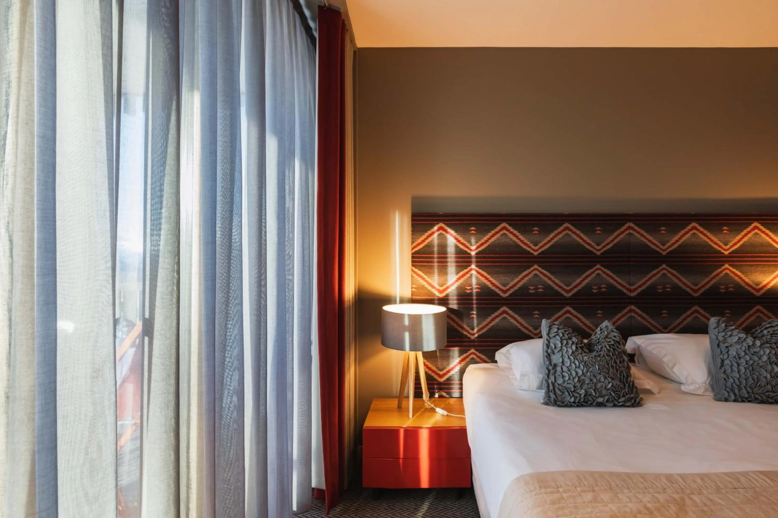 Bed in L'Aiguille Grive Chalets Hotel