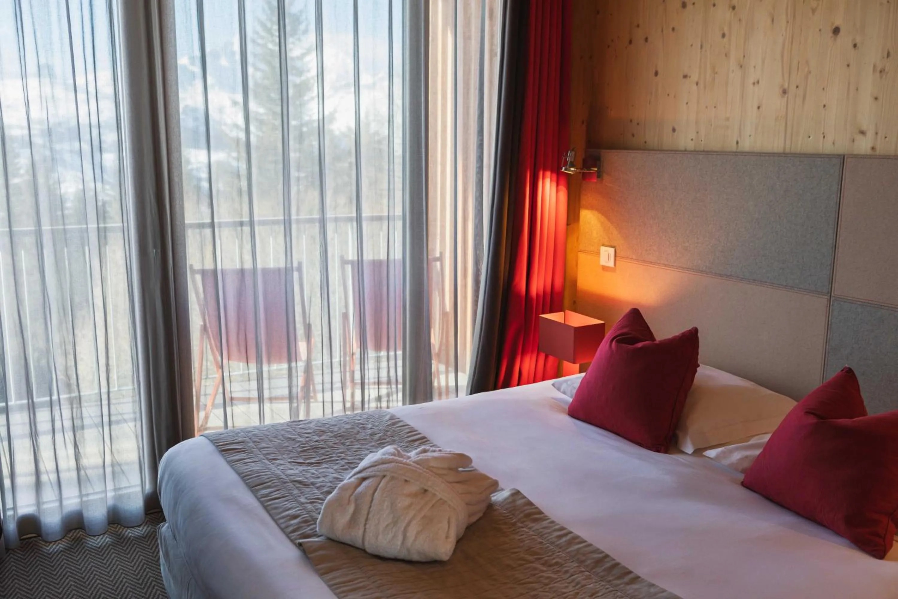 Bed in L'Aiguille Grive Chalets Hotel