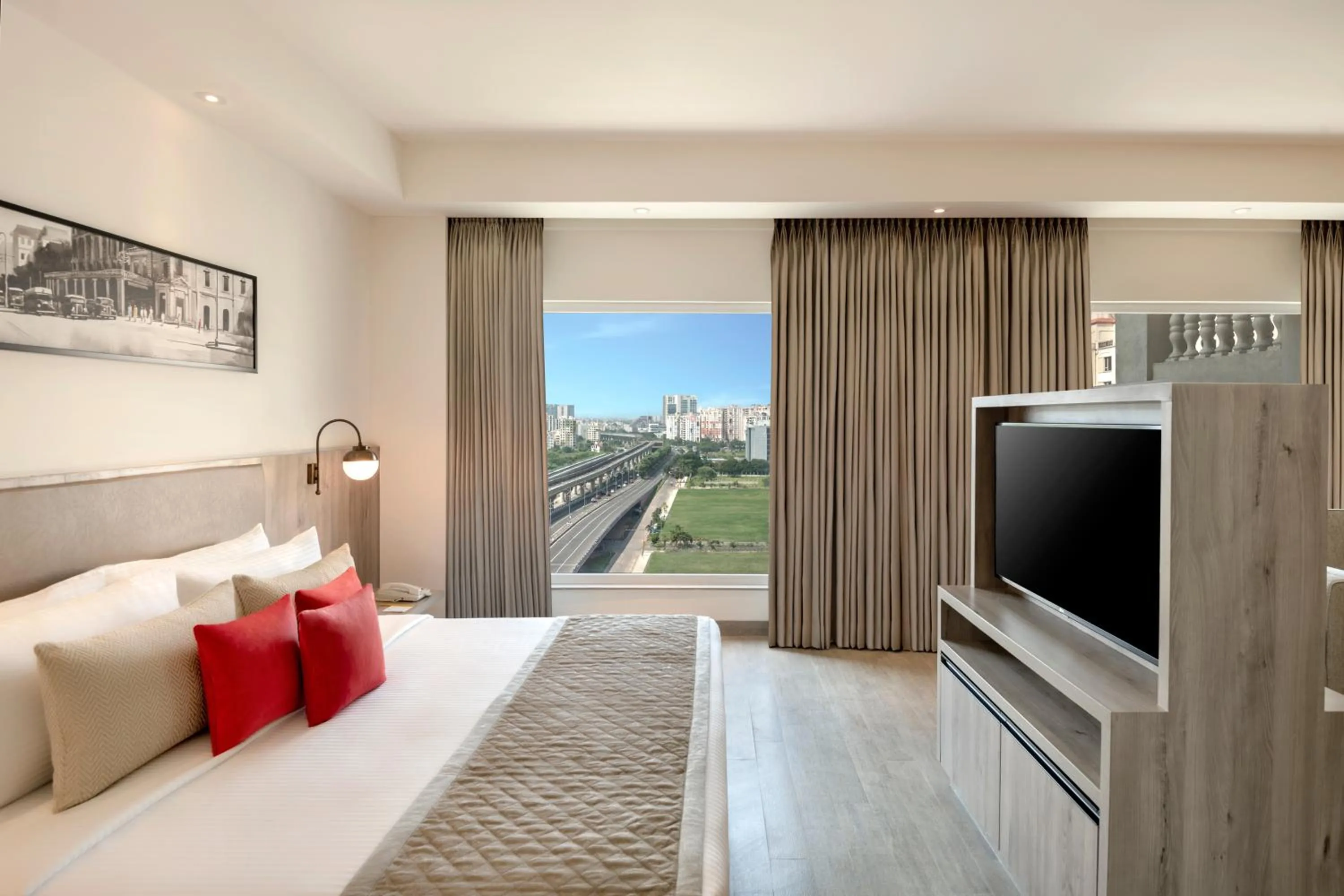 Photo of the whole room, Bed in Lemon Tree Premier, New Town, Kolkata