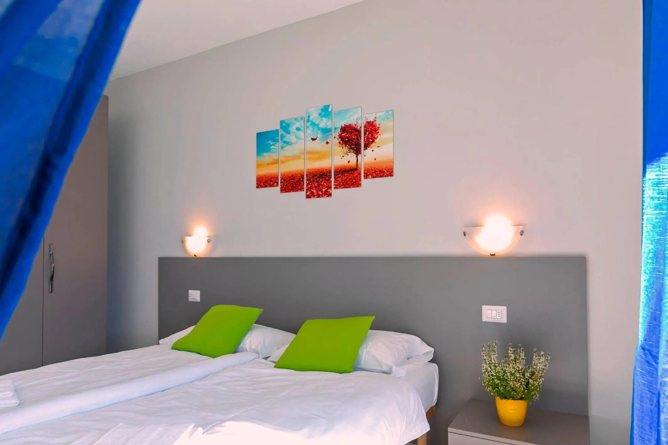 Bedroom in La Collinetta Apartments