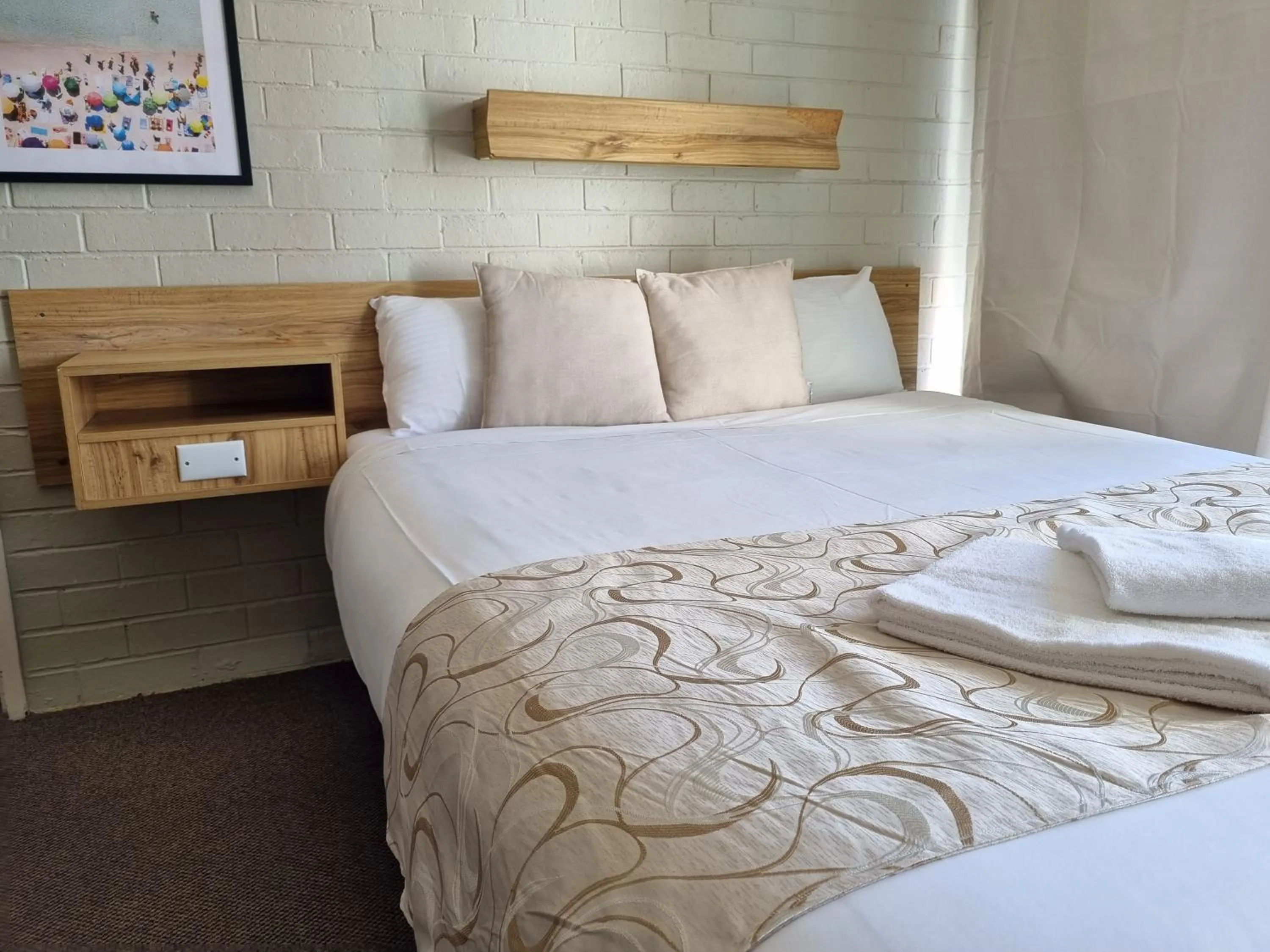 Bed in Moon River Motor Inn