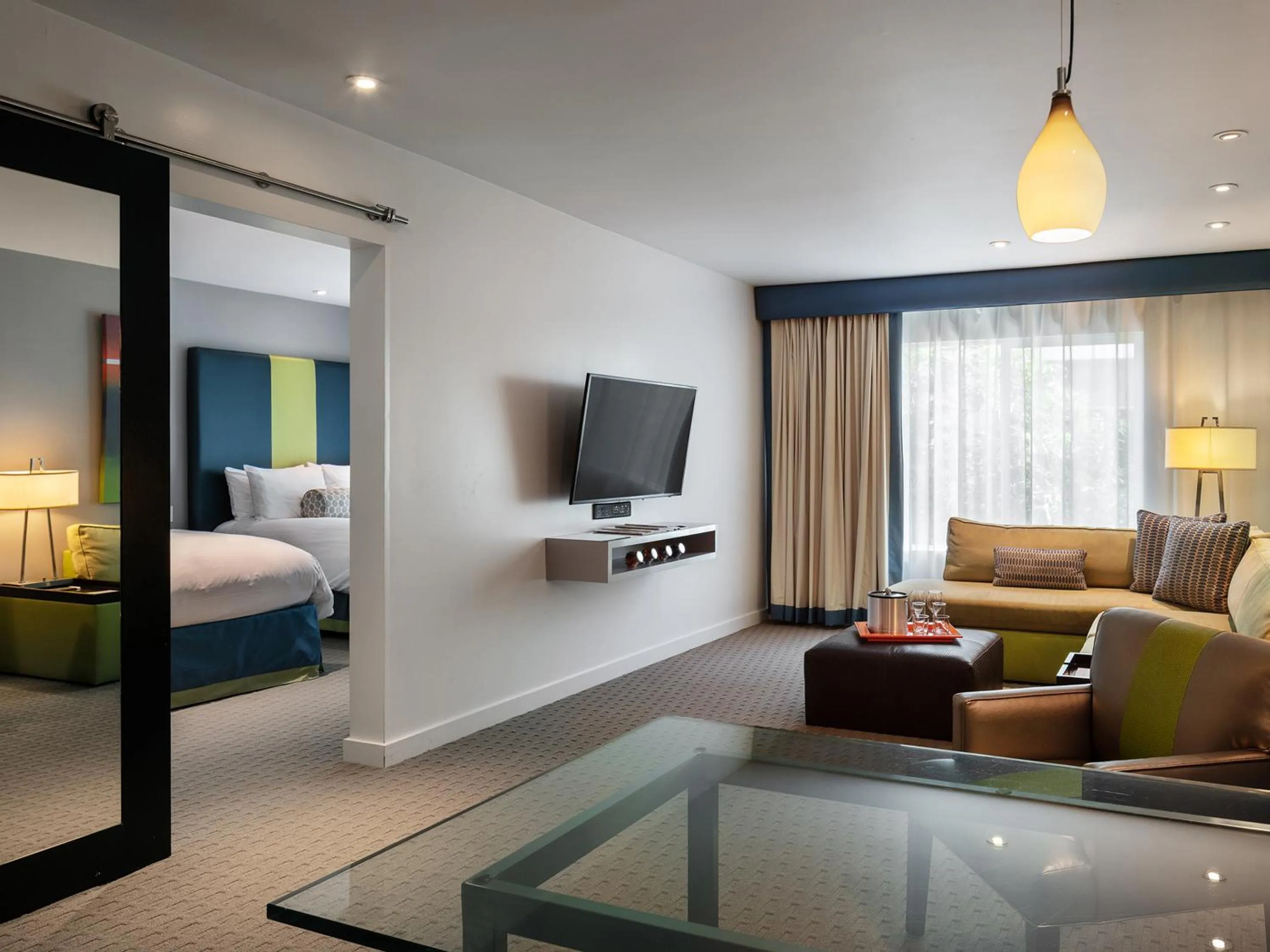 Living room, Bed in Sunset Marquis Hotel