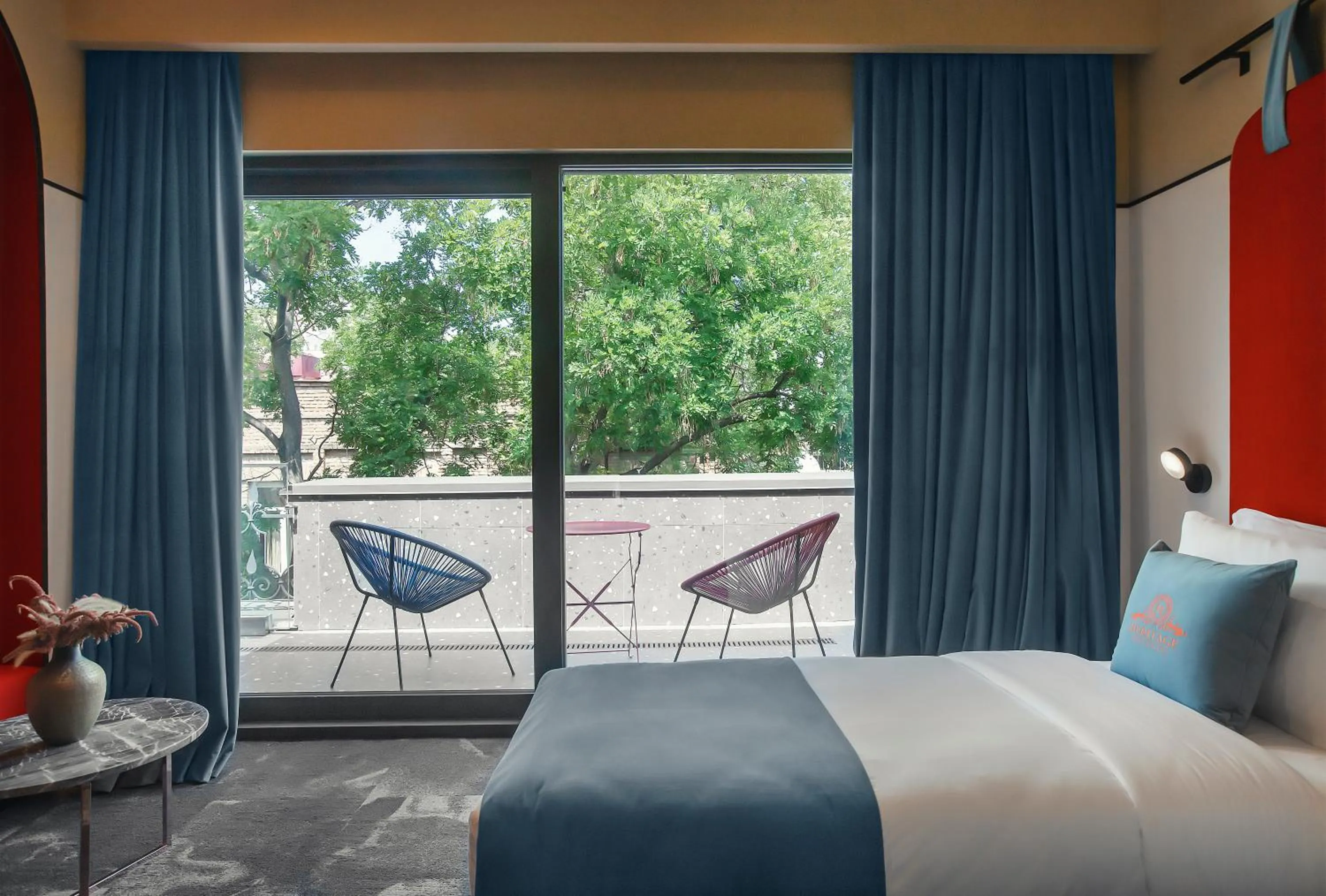 Bed in Heritage Hotel and Suites