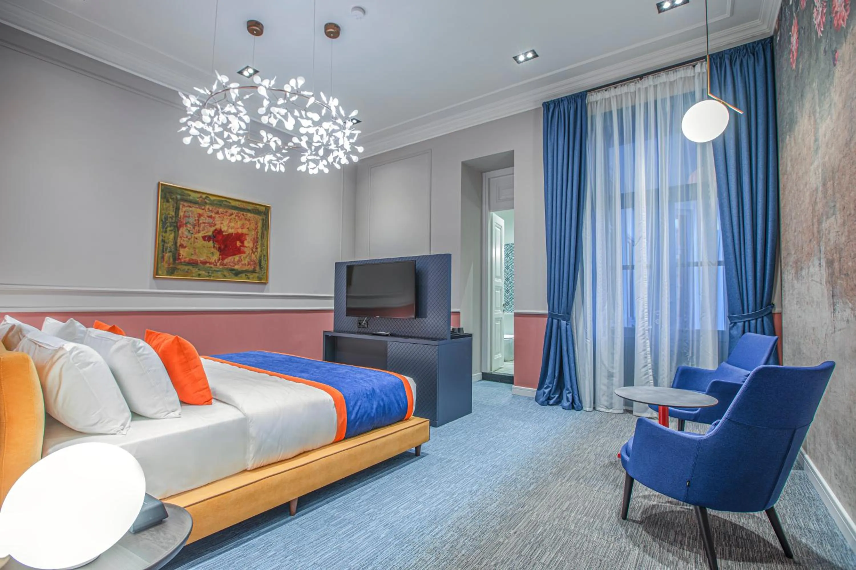 Bed in Heritage Hotel and Suites