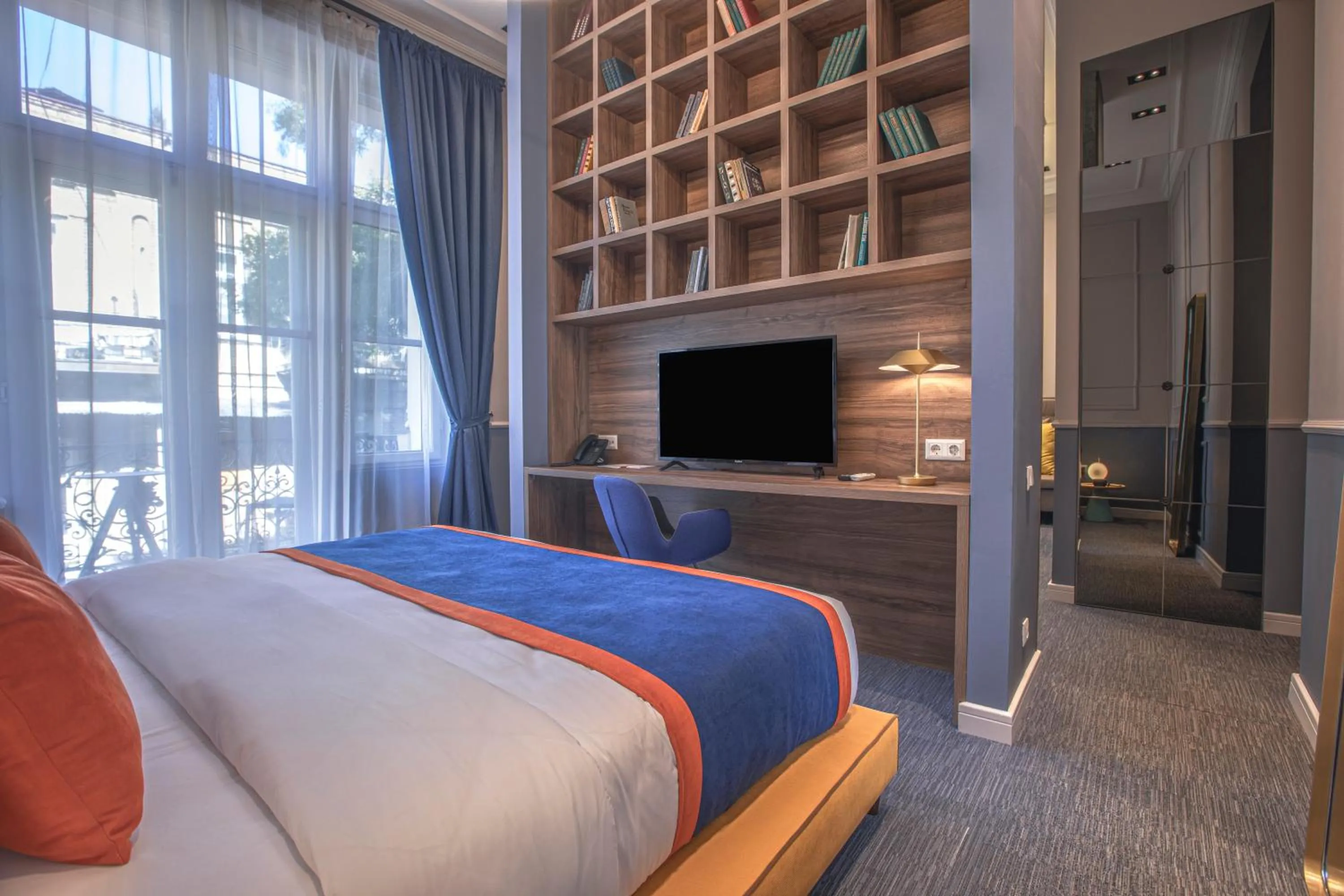 Bed in Heritage Hotel and Suites